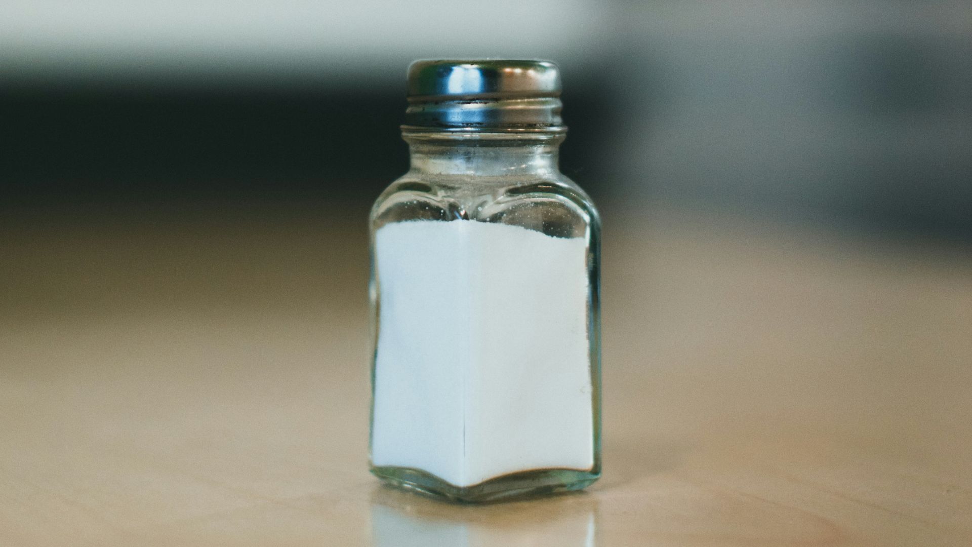 a glass jar with a clear lid