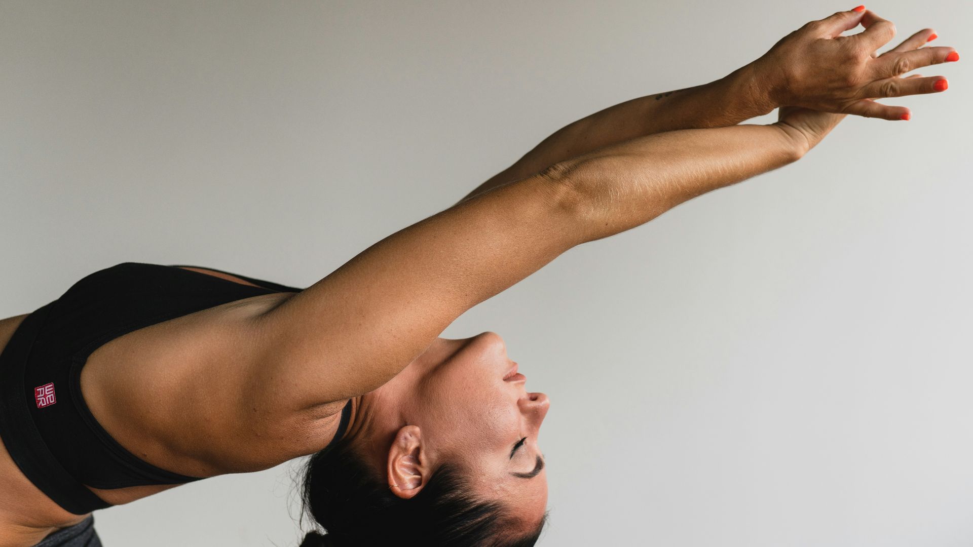 woman stretching arms