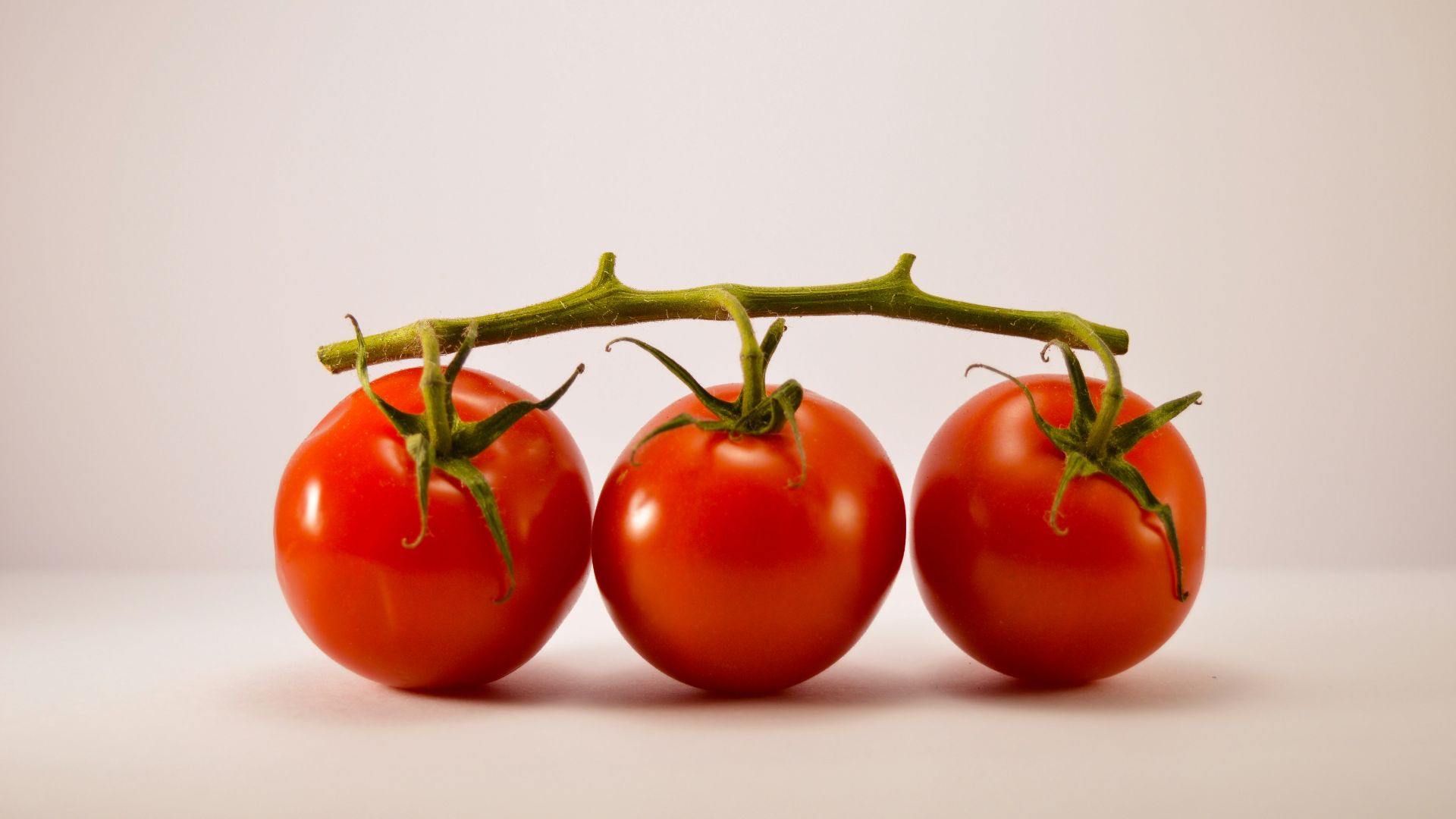 three cherry tomatoes
