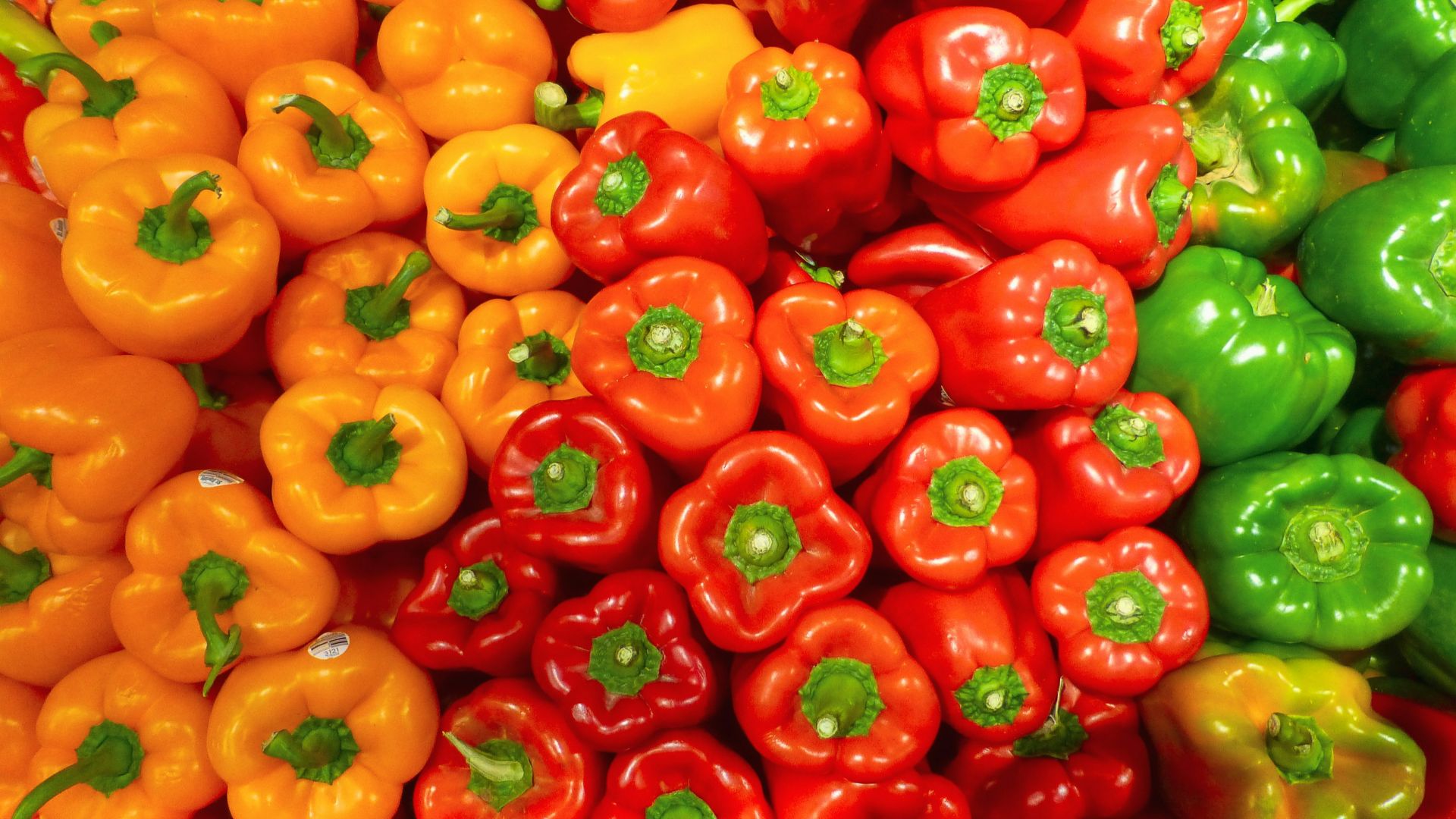 orange bell peppers on white ceramic plate