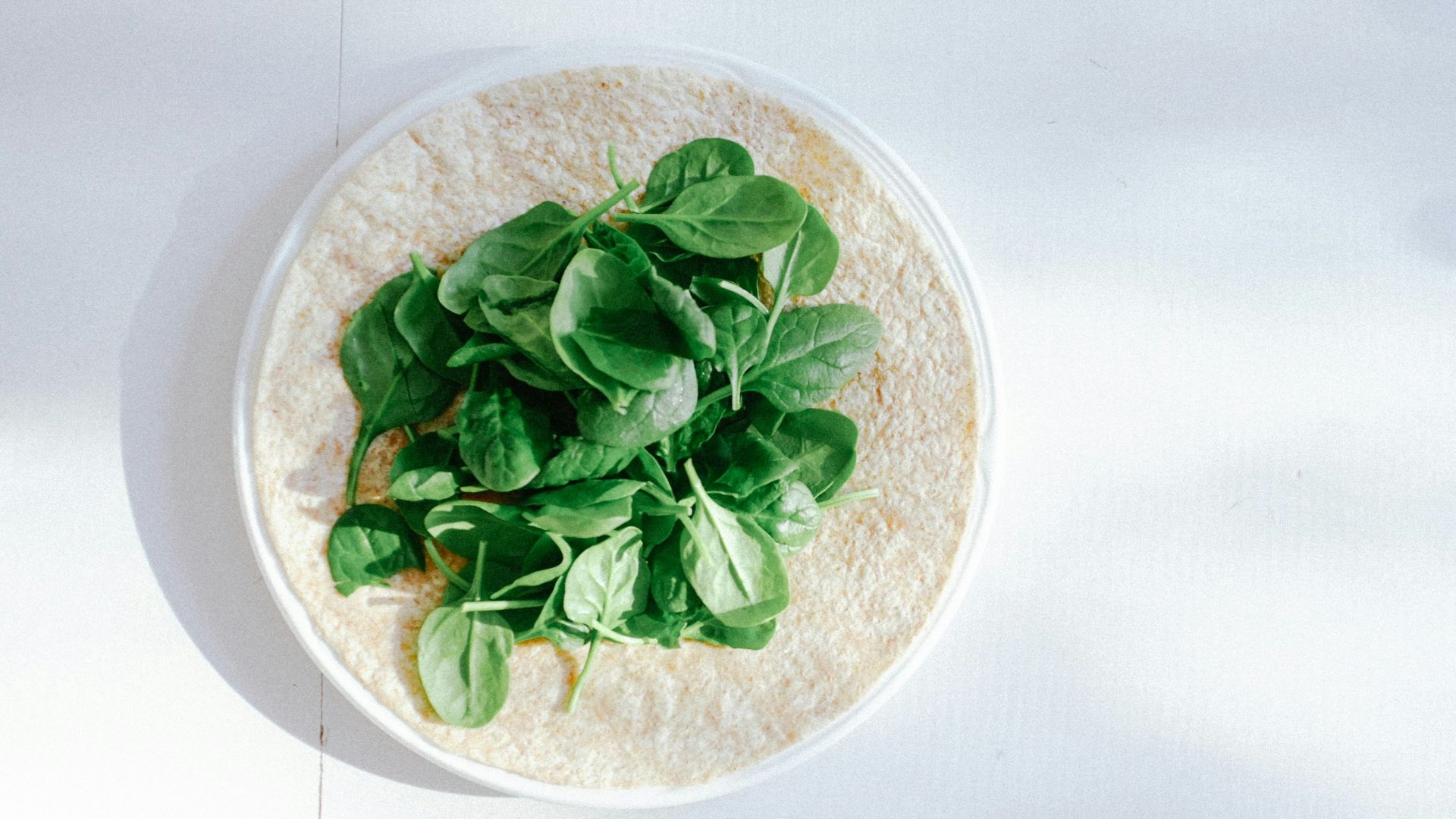 green vegetable leaves on plate