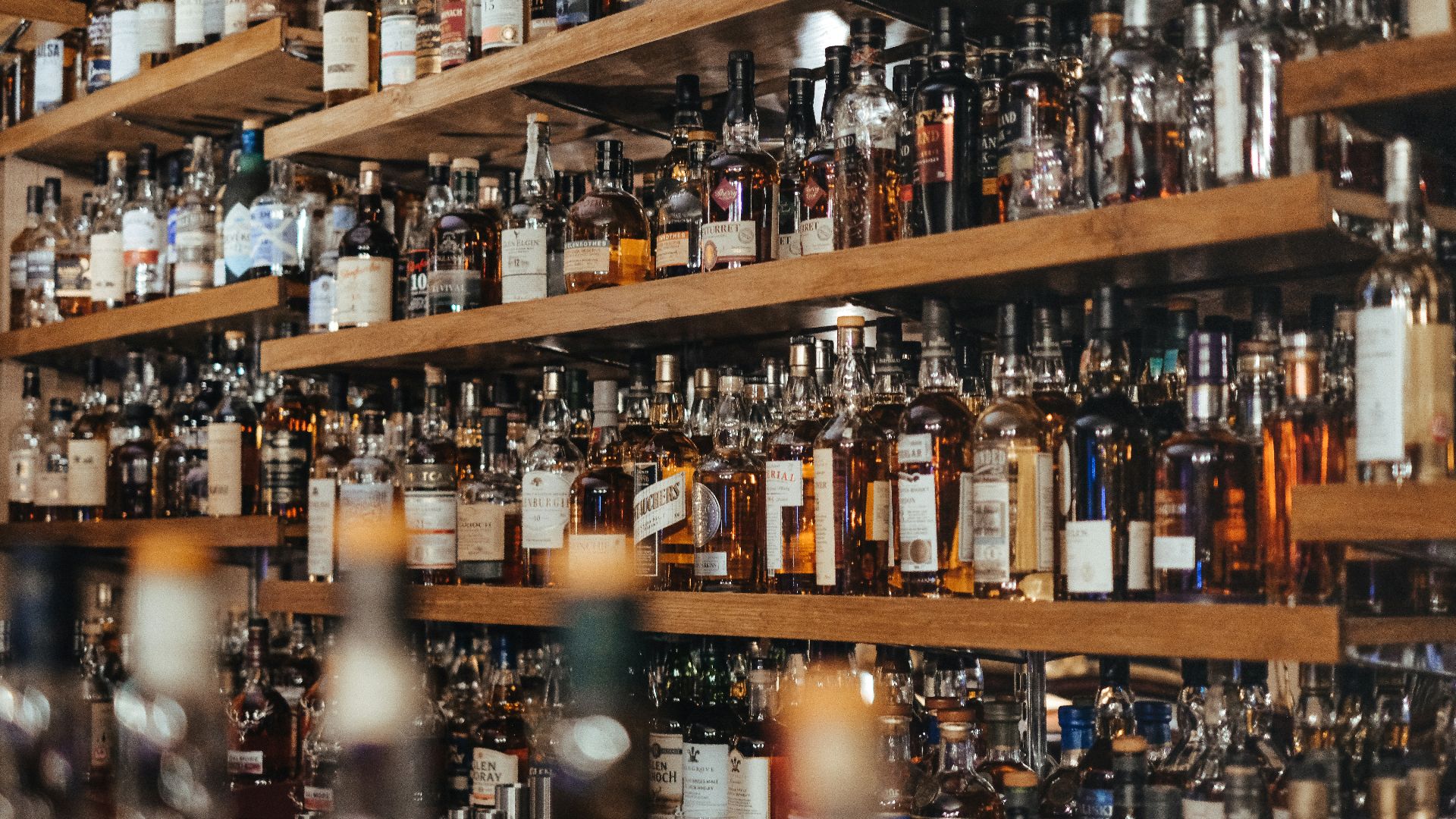 assorted-color bottle lot on shelf