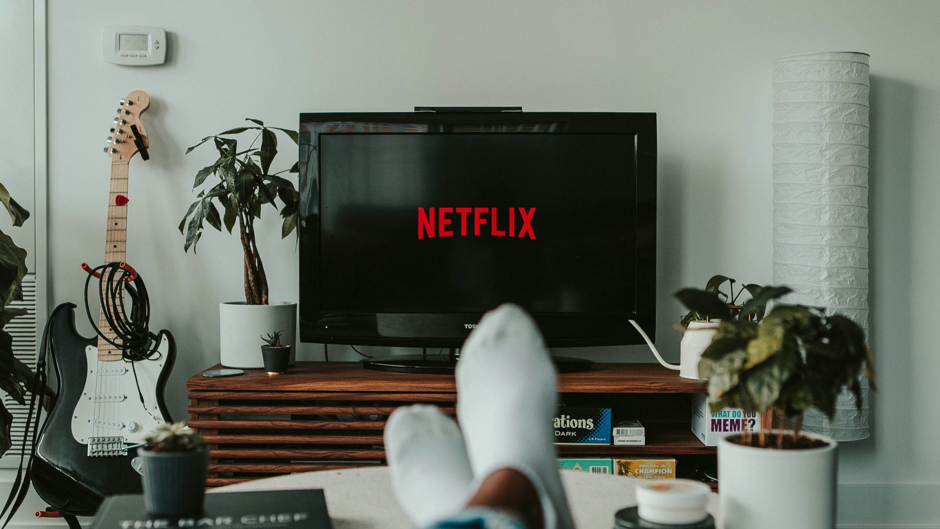 black flat screen tv turned on displaying 11