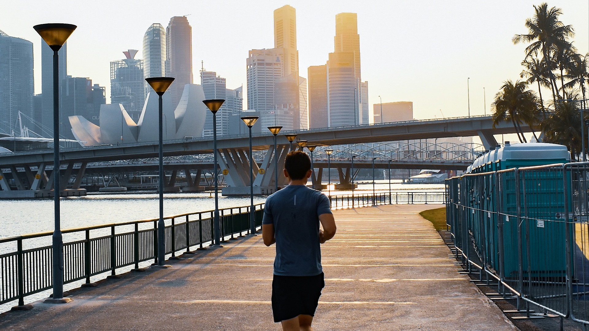 man jogging on street during daytime
