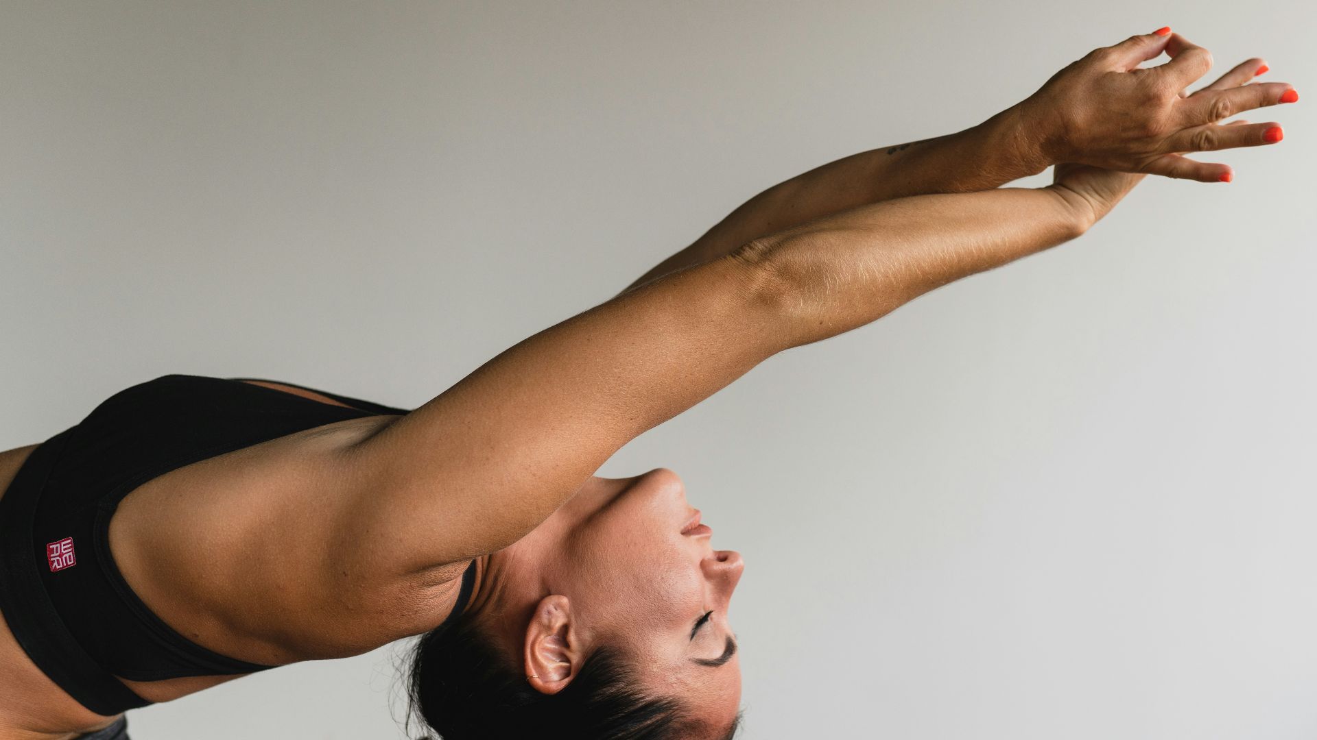 woman stretching arms