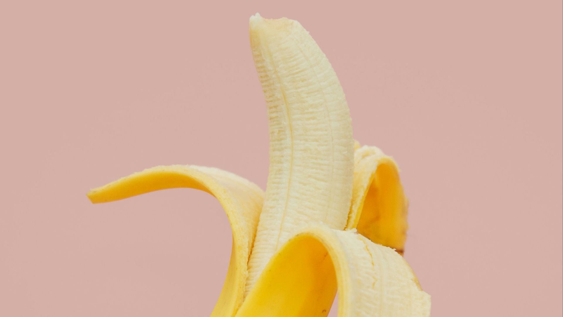 half peeled banana fruit