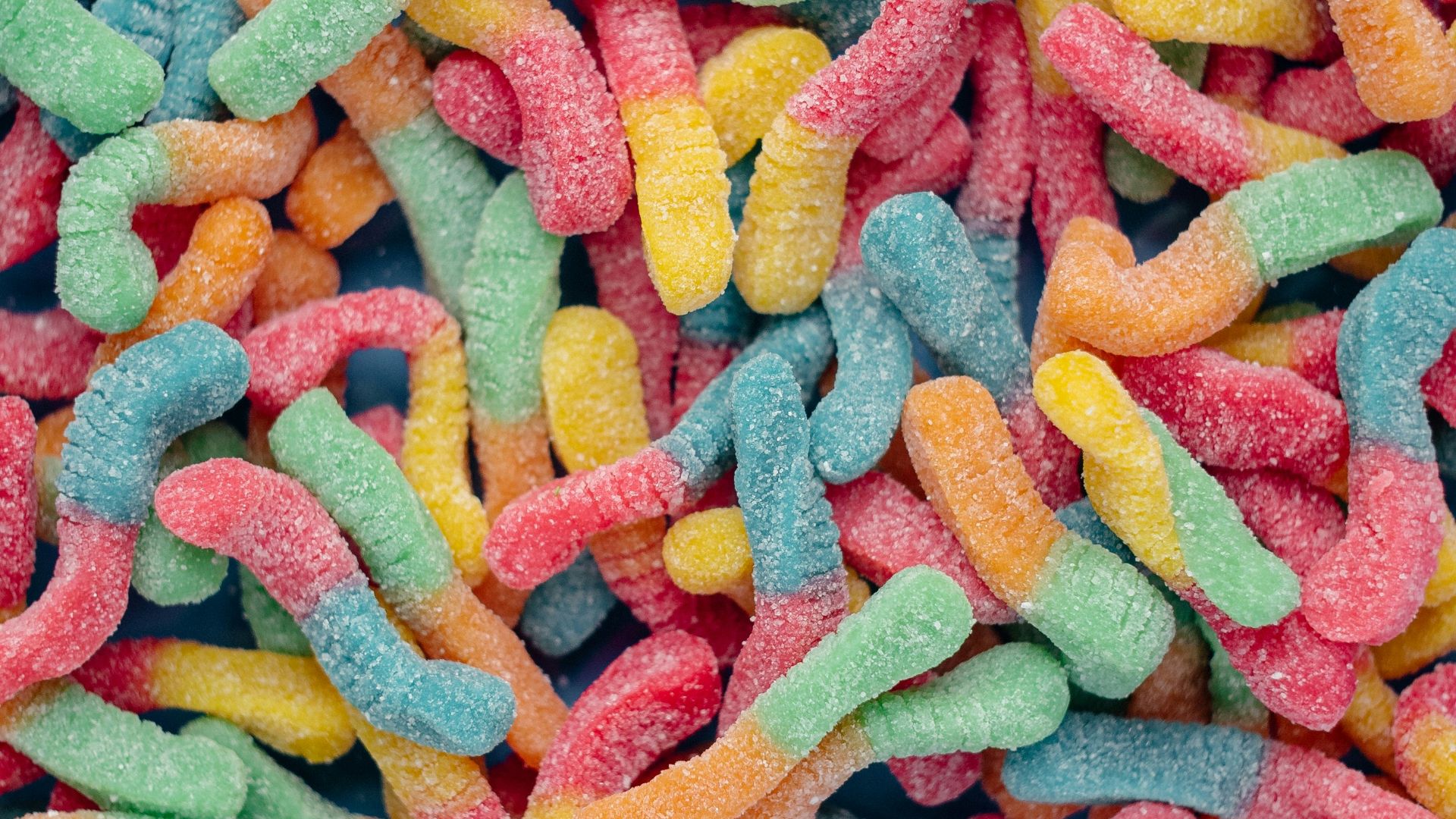 pink yellow and blue candies