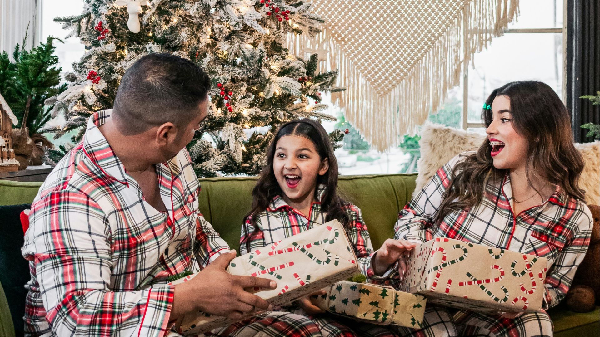 a couple of people that are sitting on a couch