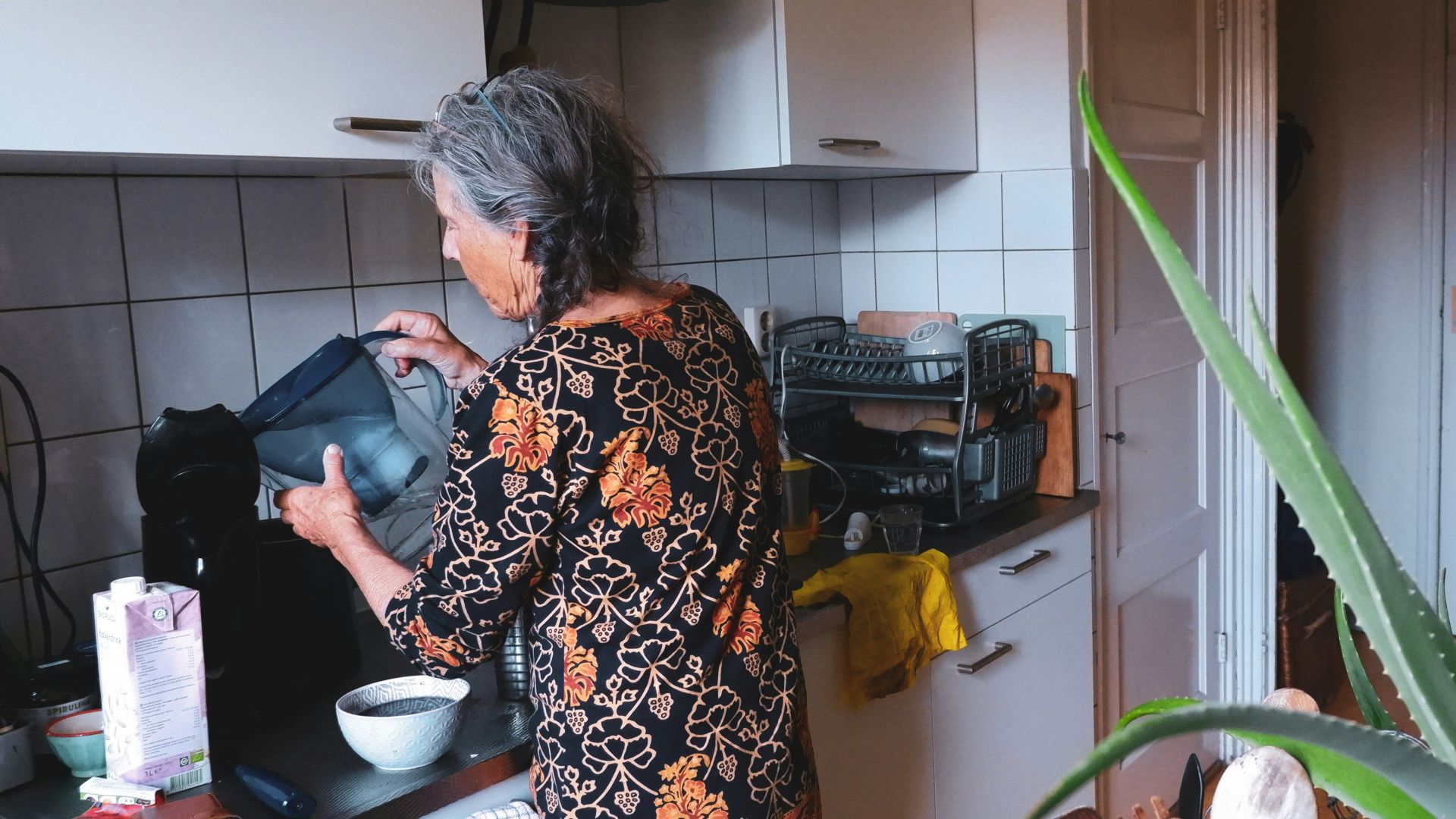 a person in a kitchen