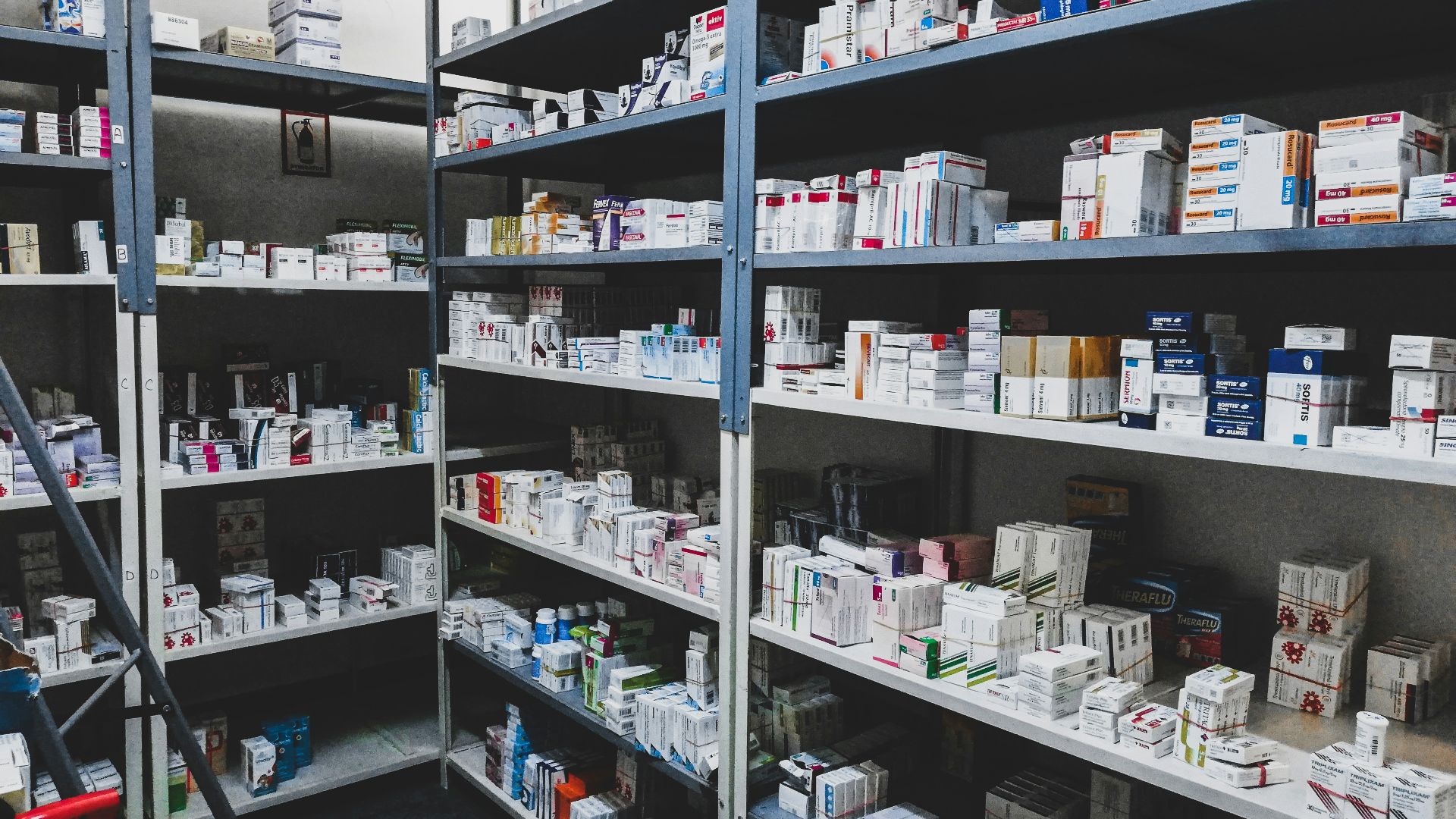a room filled with lots of shelves filled with boxes and boxes