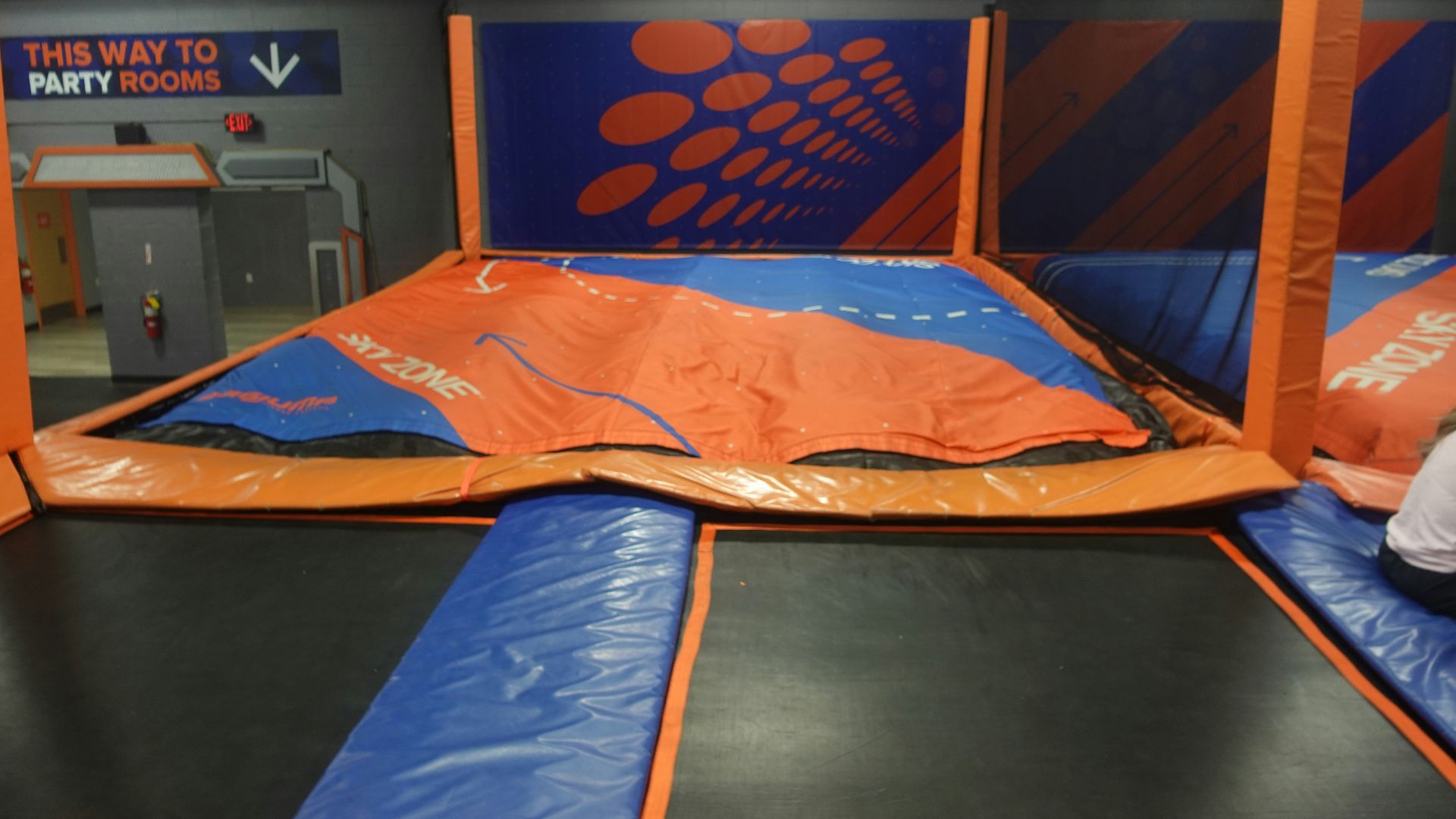 An indoor trampoline park is ready for fun.