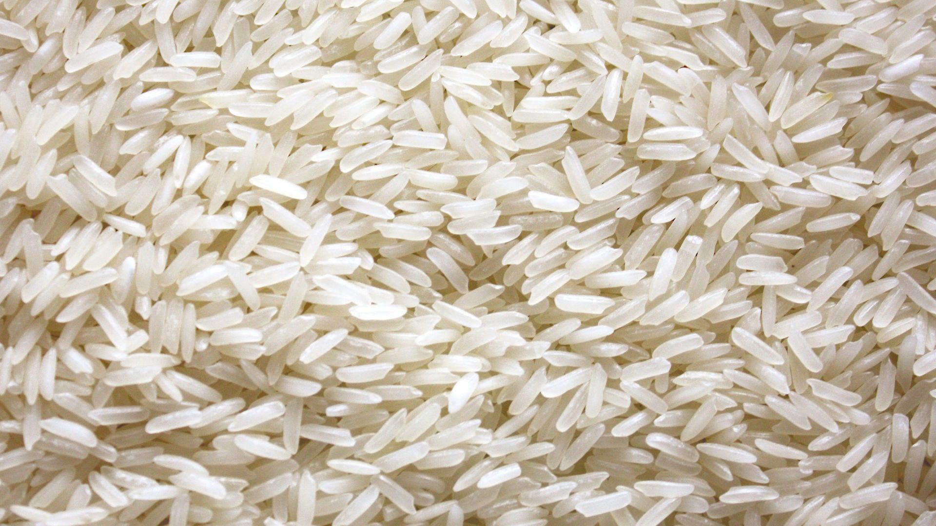 a pile of white rice sitting on top of a table