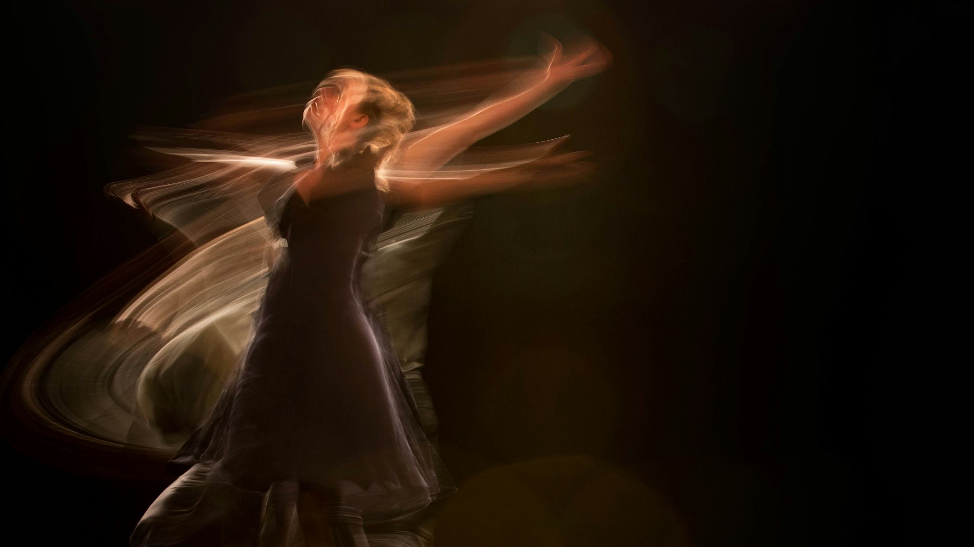 a couple of people that are dancing on a stage