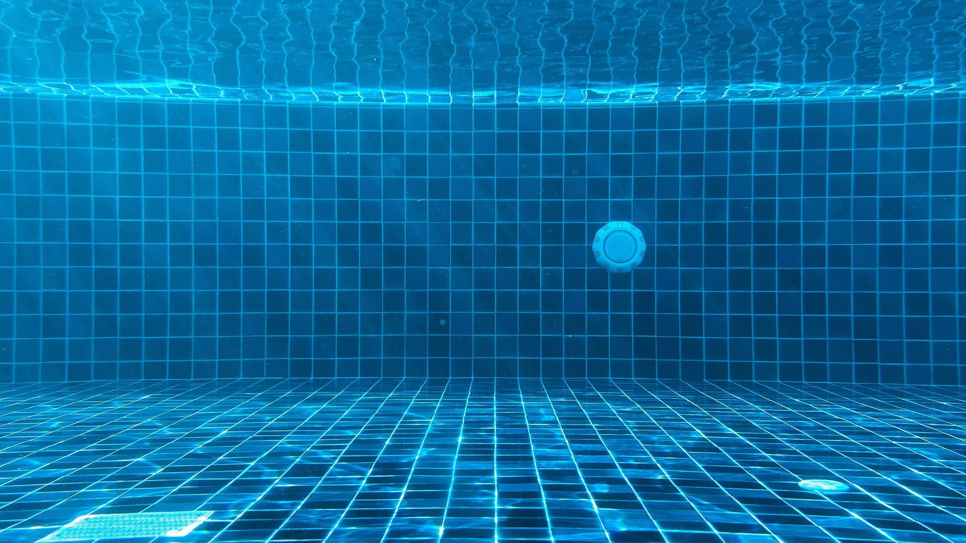 blue swimming pool with water