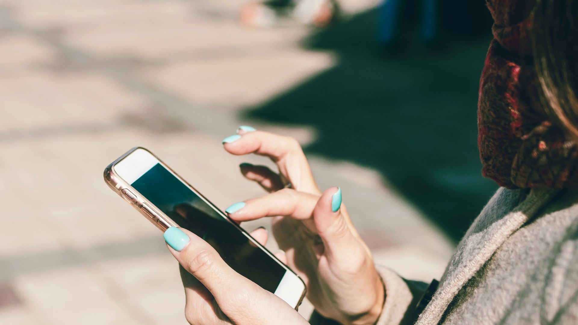 woman using smartphone