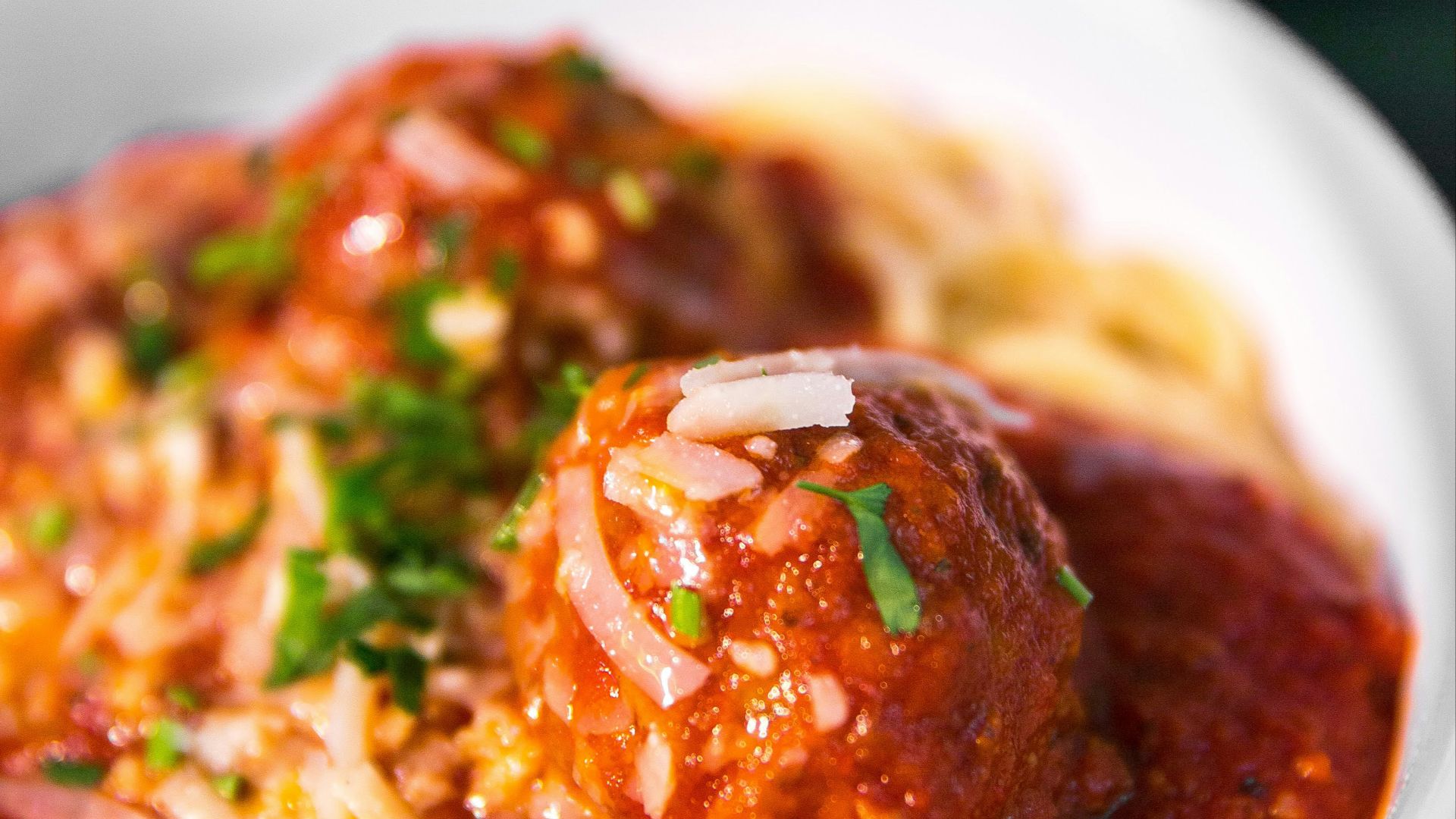 meta balls with noodles served on white ceramic bowl
