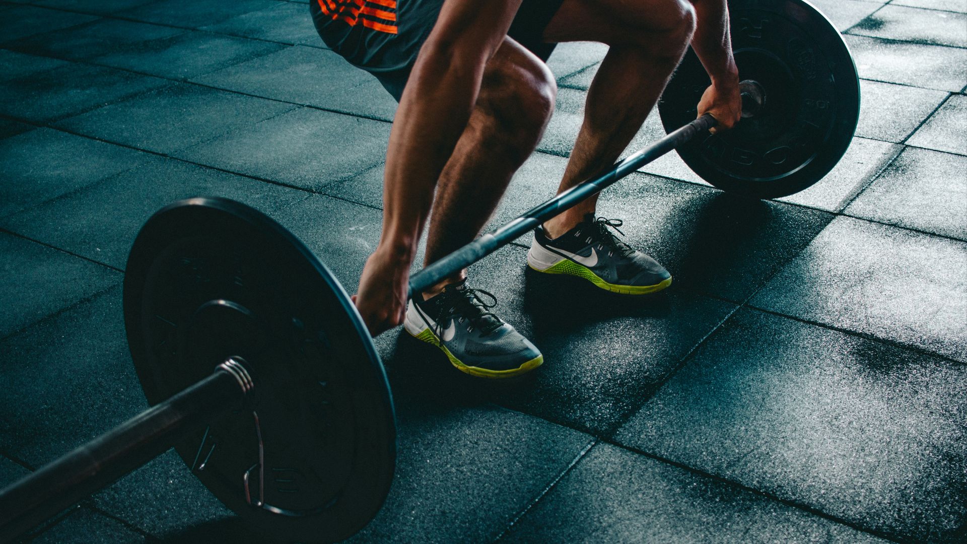 person about to lift the barbel