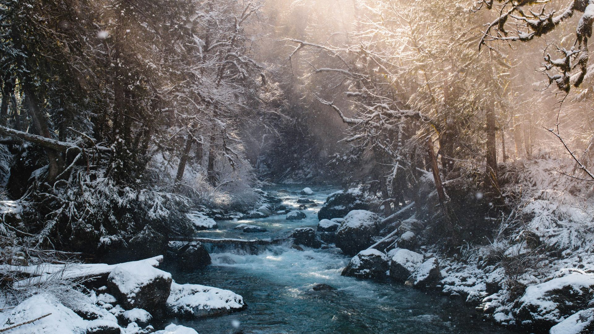 river between snow filled soil