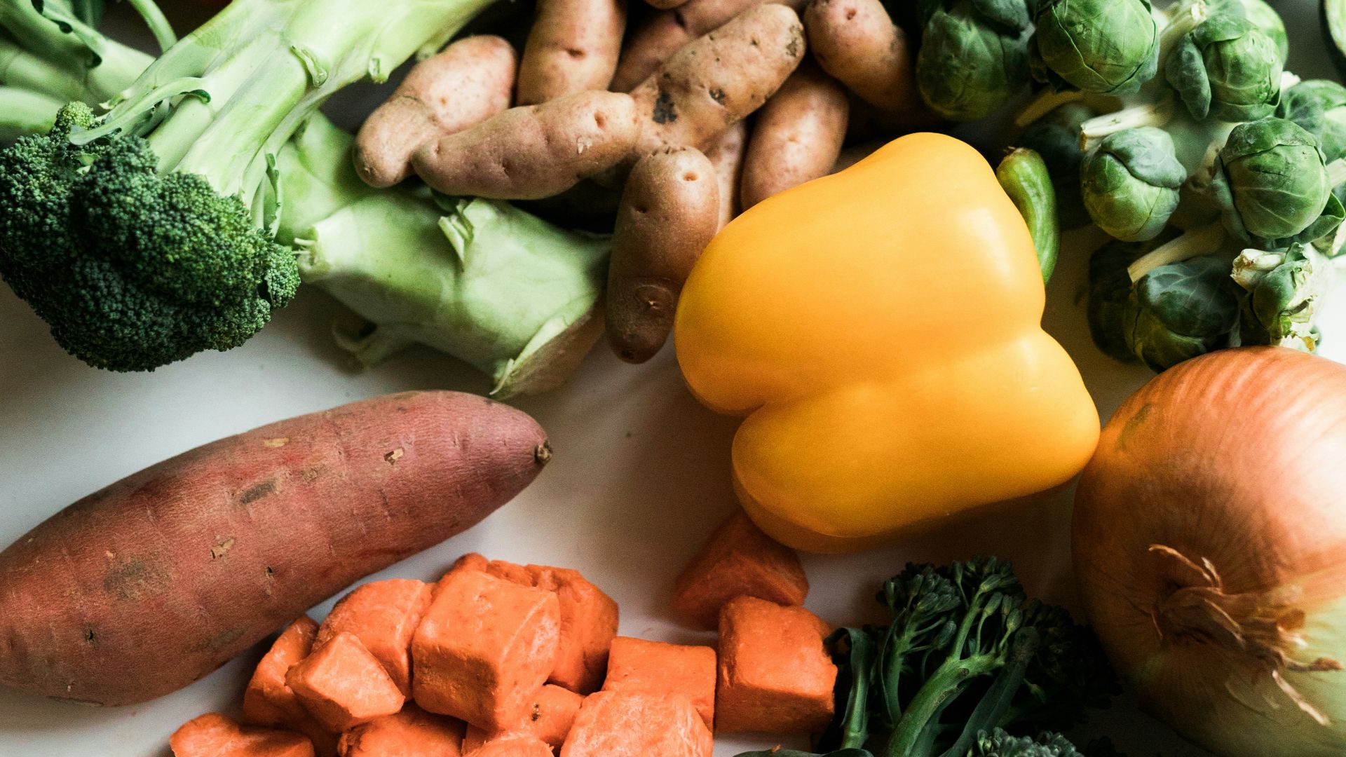 sliced carrots and green vegetable