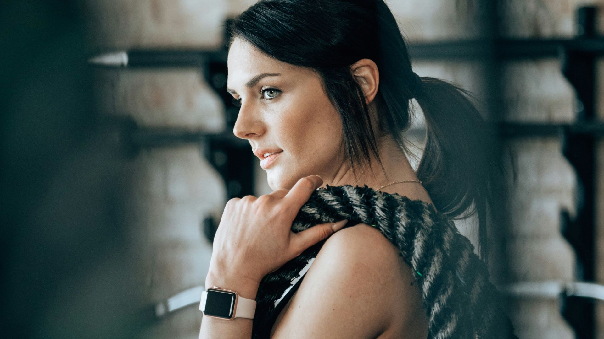 woman holding black rope