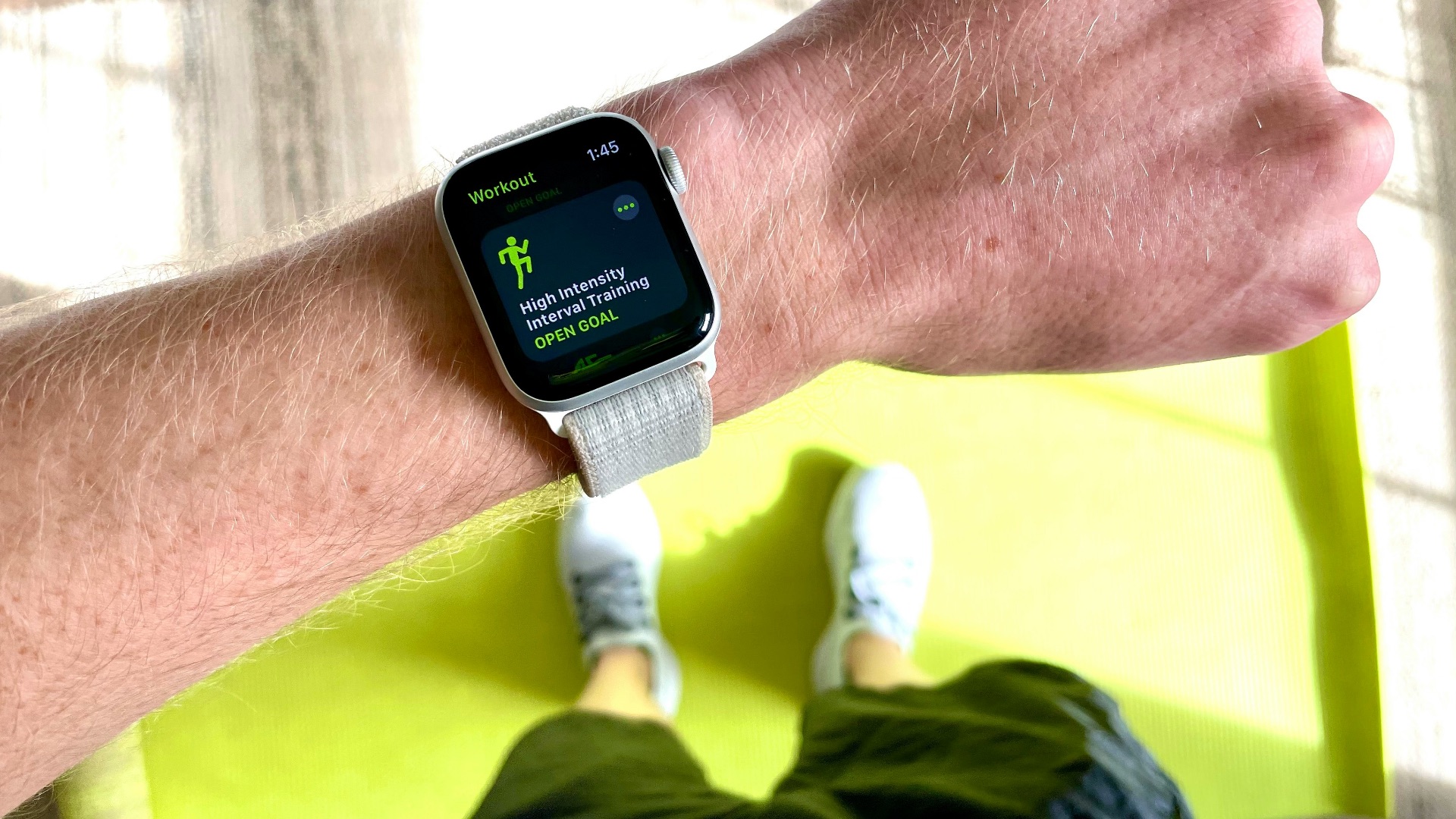 silver aluminum case apple watch with white sport band