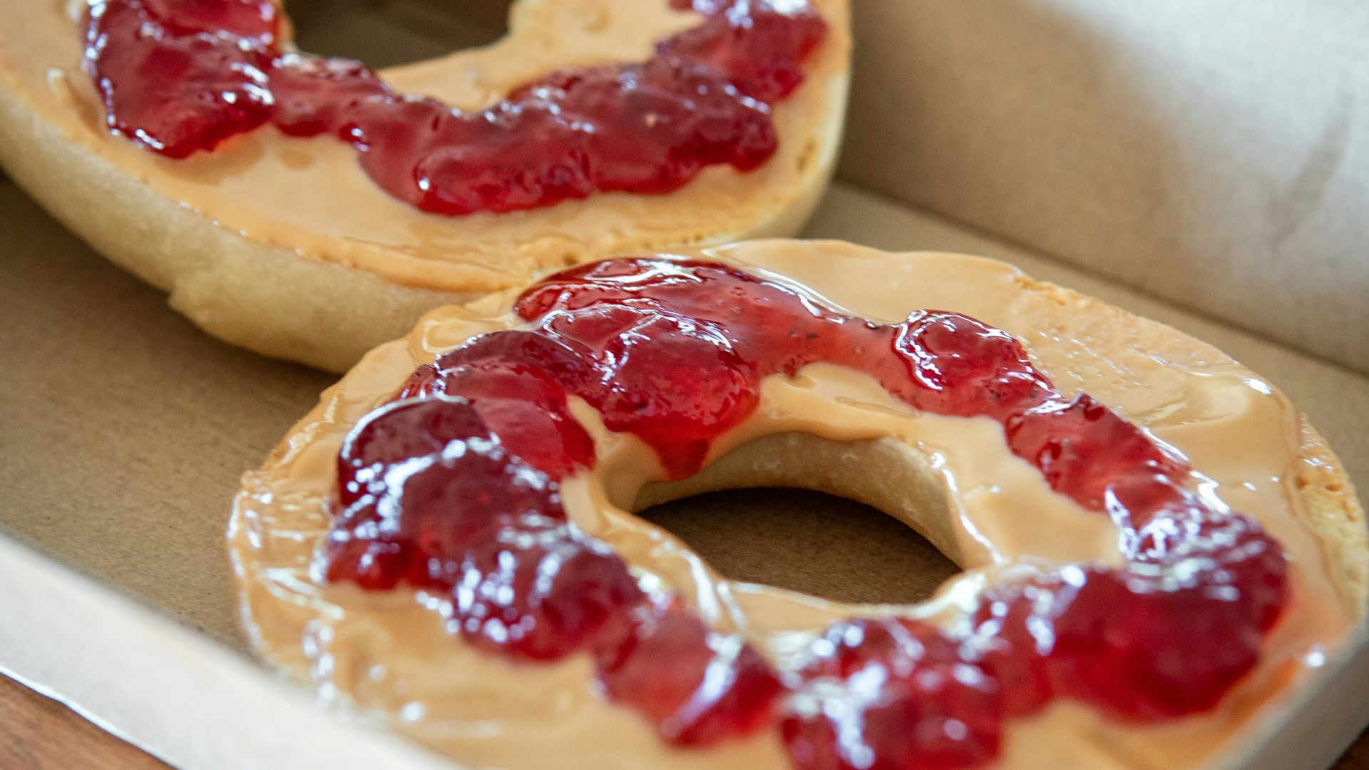 two bread with sauce in box