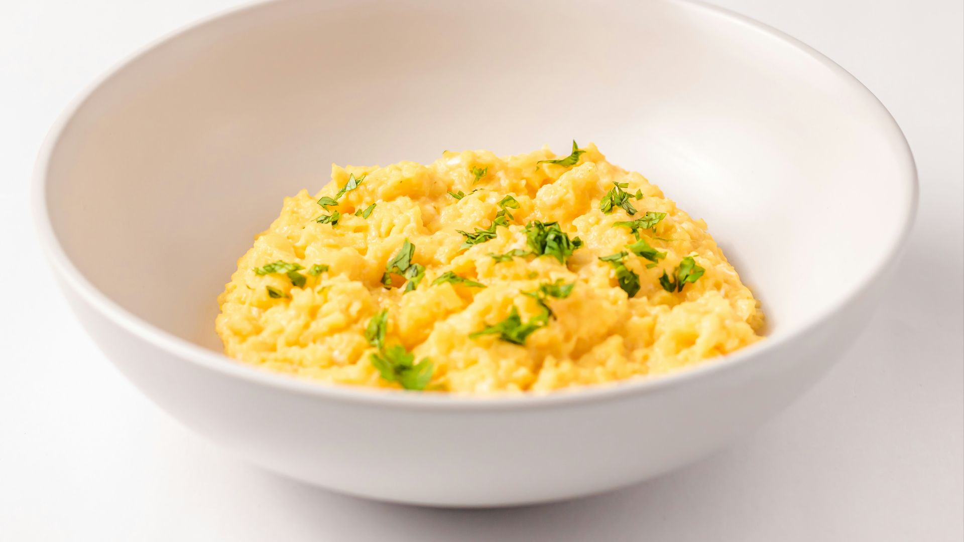 a close up of a bowl of food on a table