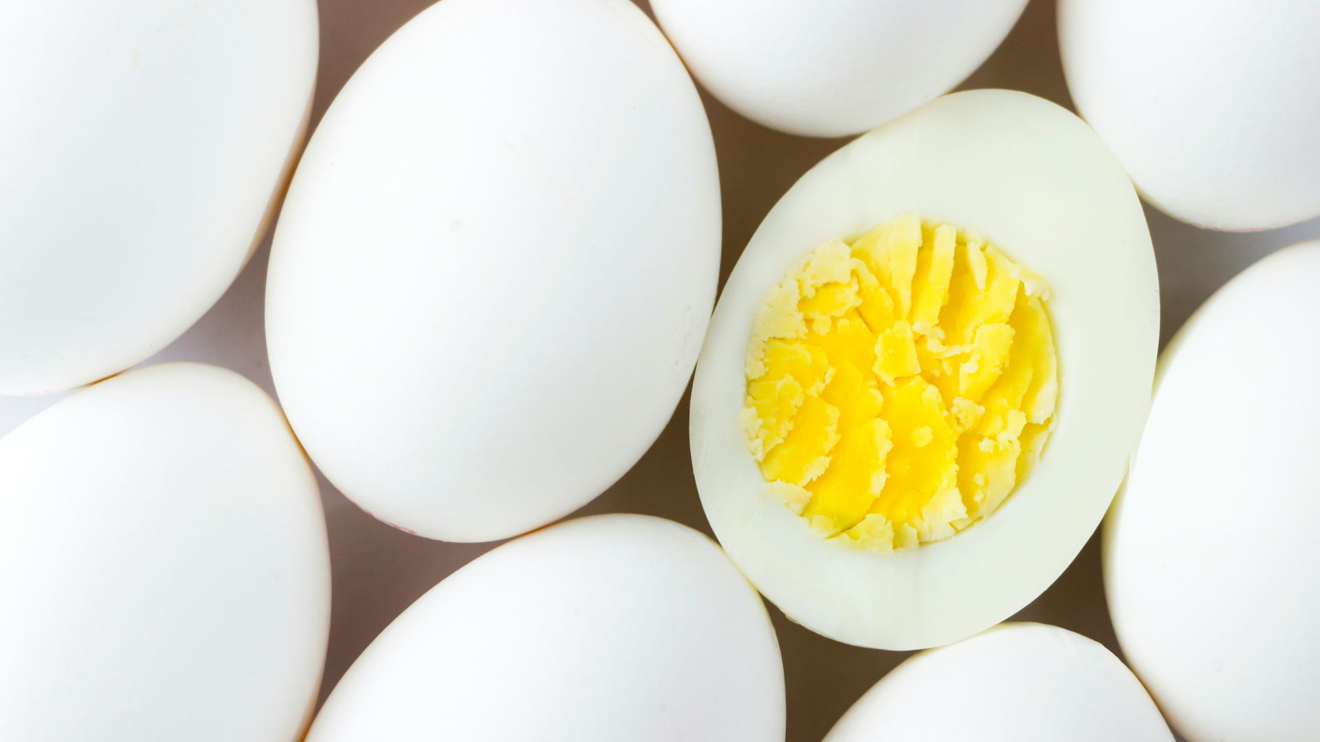 white egg lot on brown wooden table