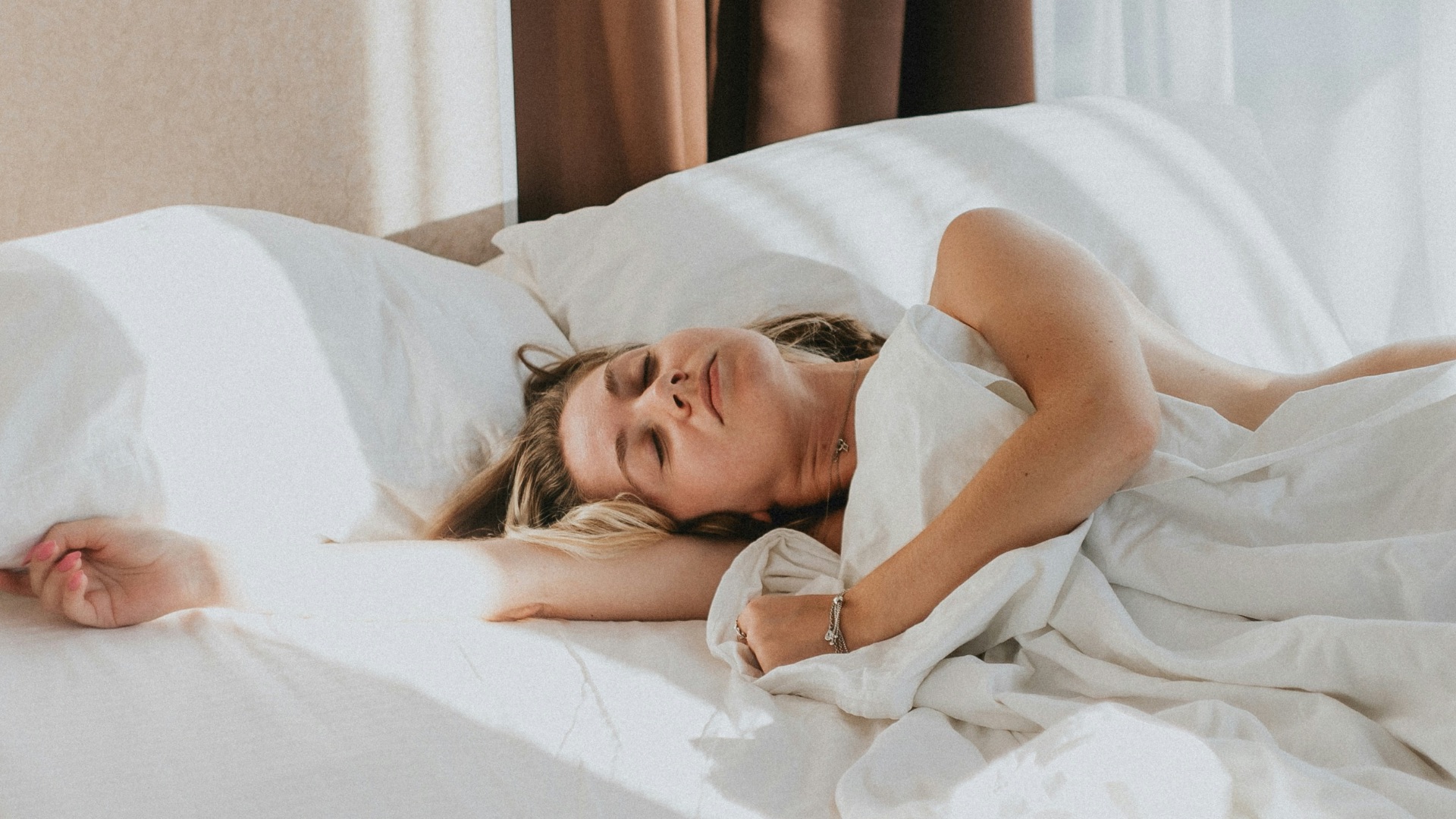 a person lying in a bed