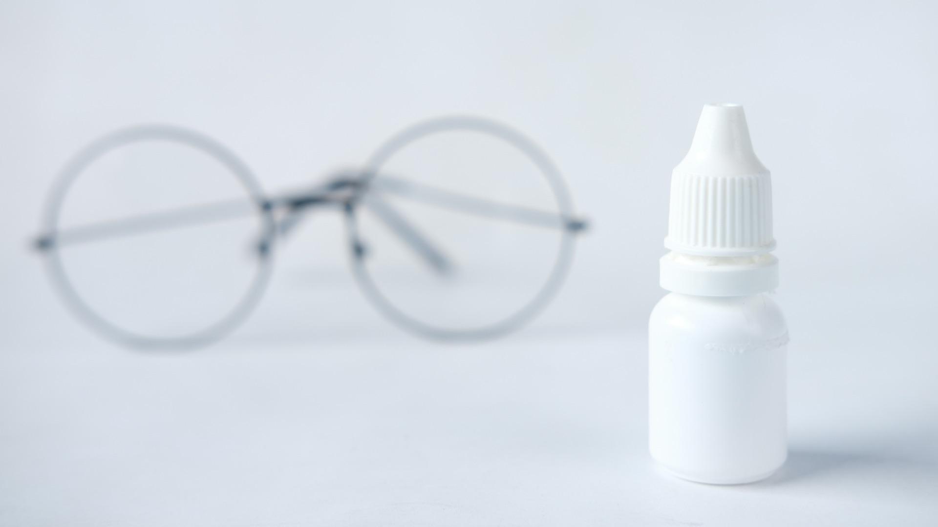 white plastic bottle with white cap