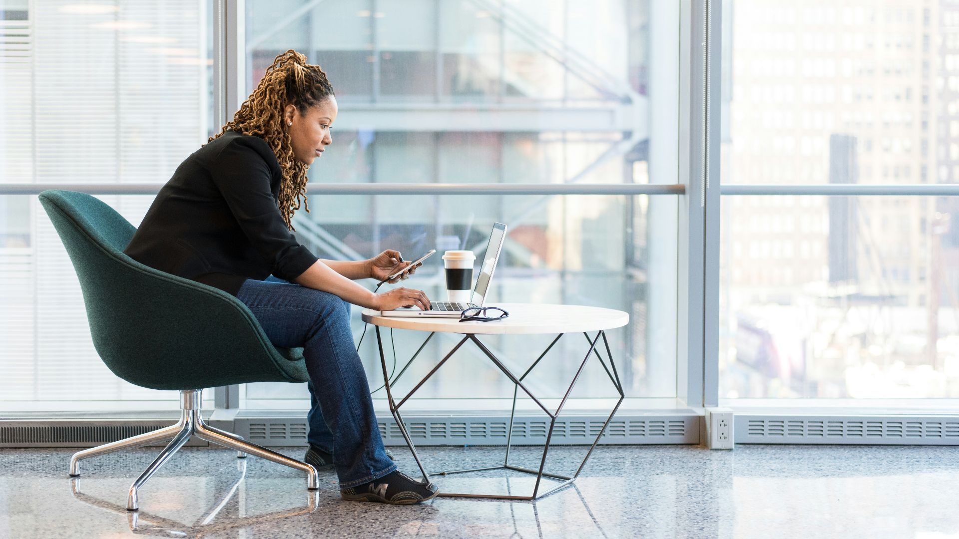 women's black elbow-sleeved blouse