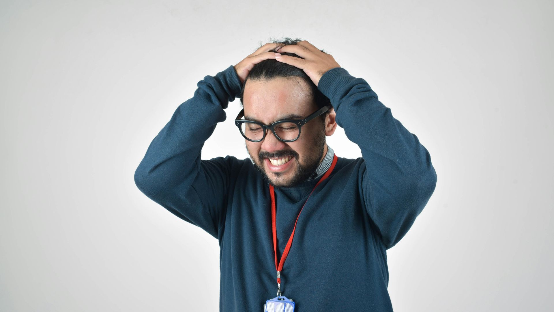 man in bluee ssweater