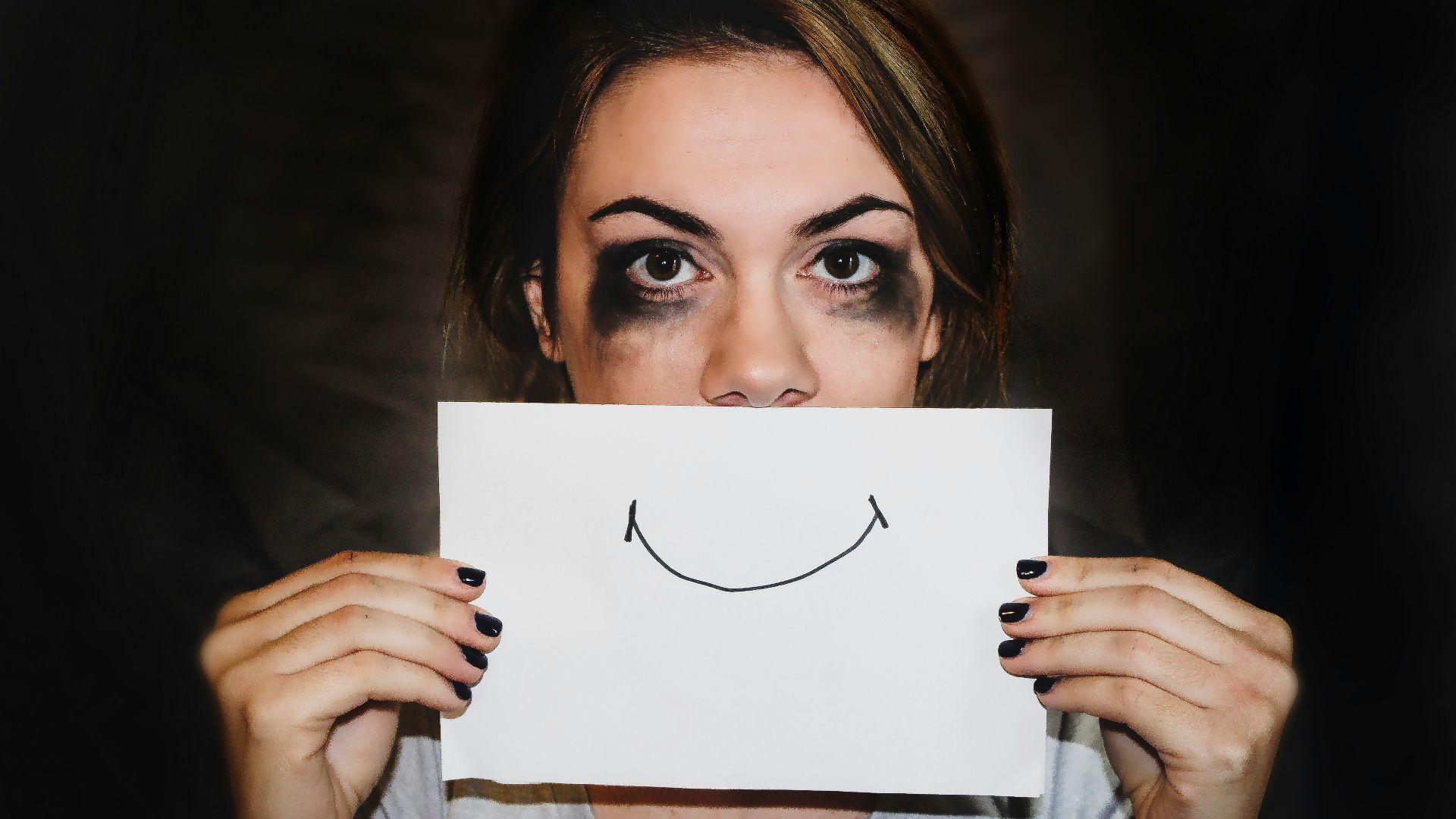 person holding white printer paper