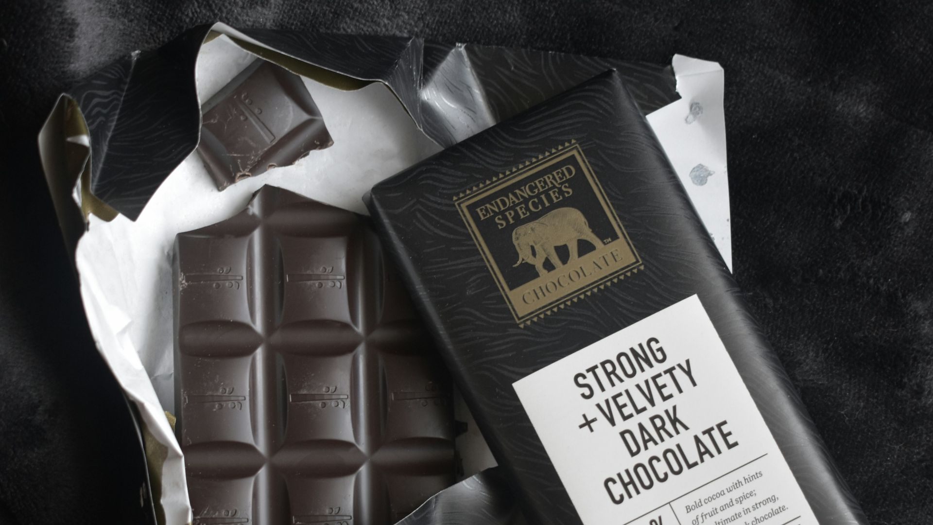 white and brown labeled chocolate bar