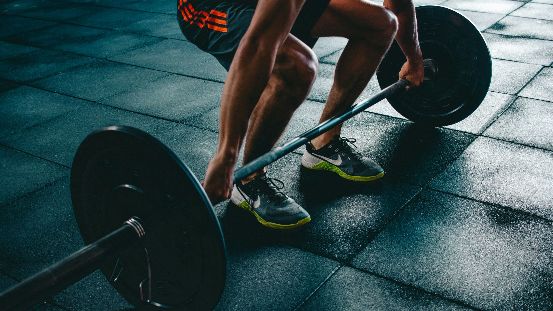 person about to lift the barbel