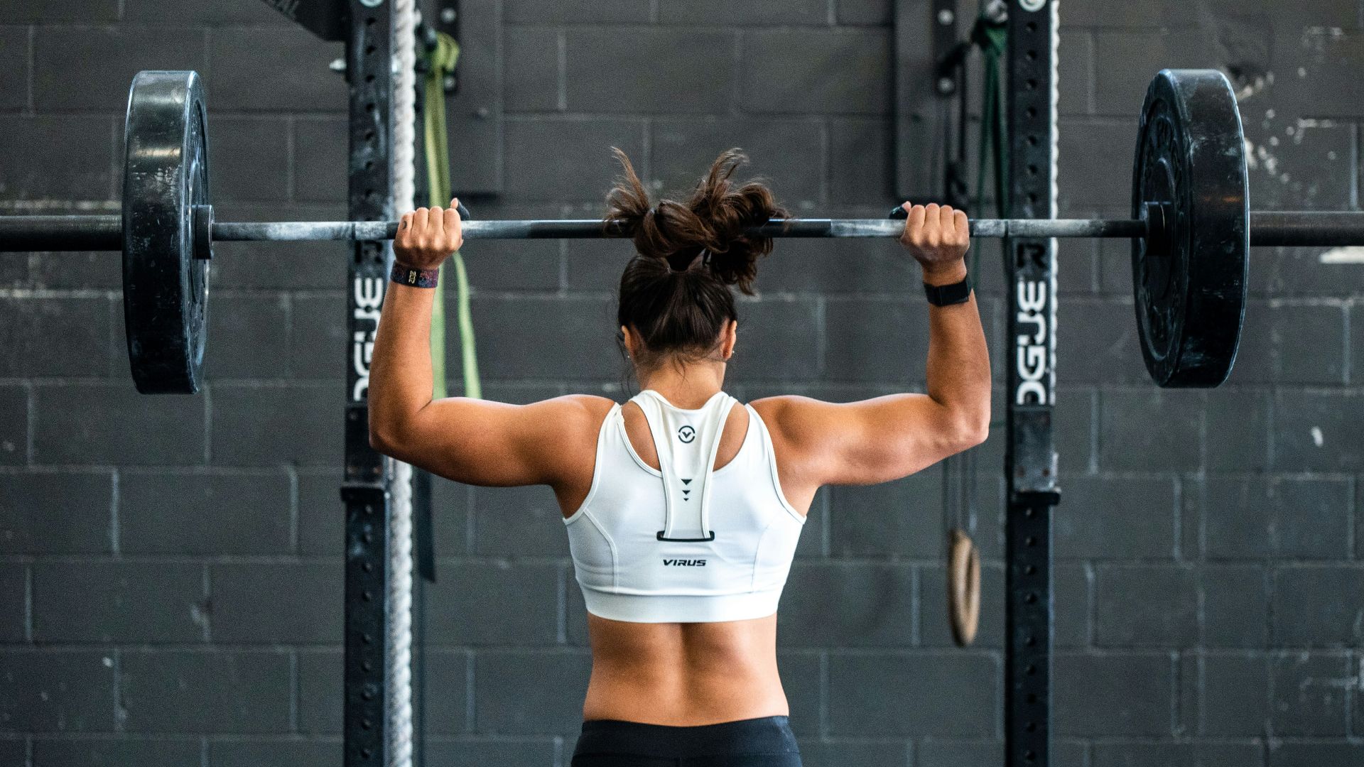 woman doing weight lifting