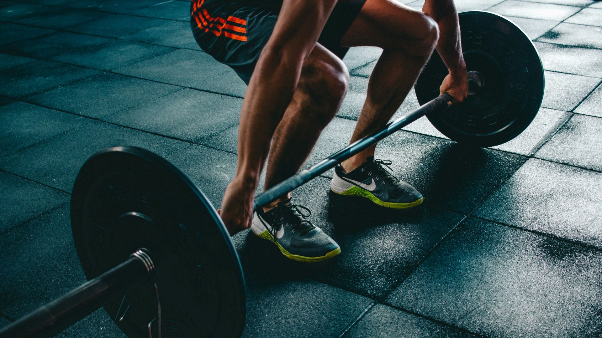 person about to lift the barbel