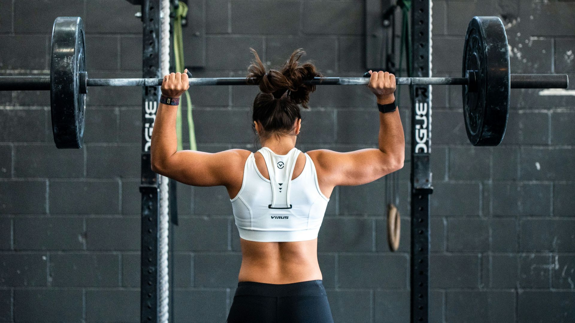 woman doing weight lifting