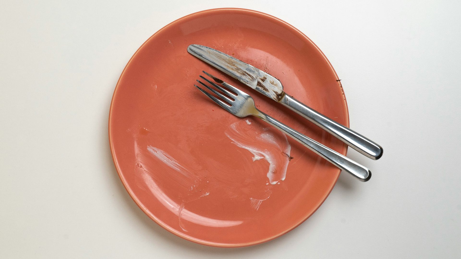 a plate with a fork and knife on it