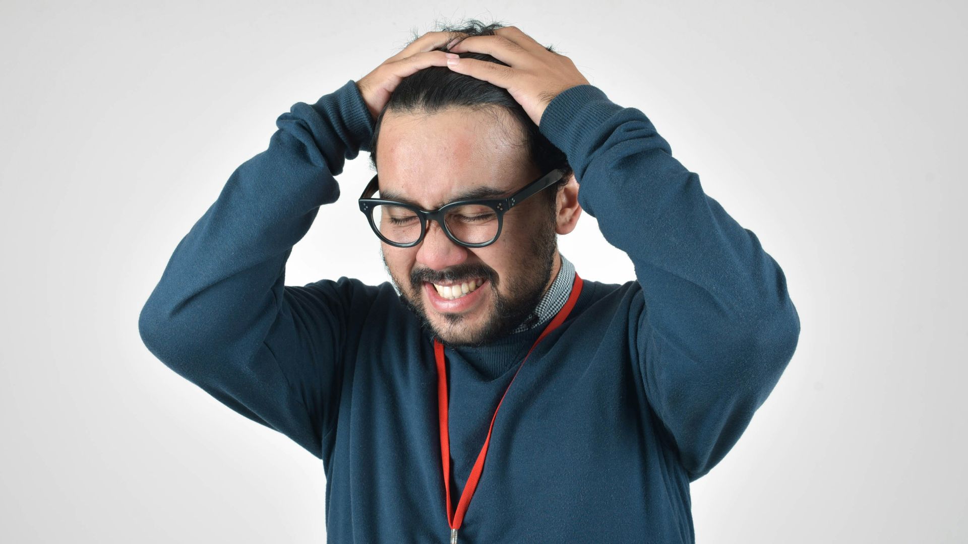 man in bluee ssweater