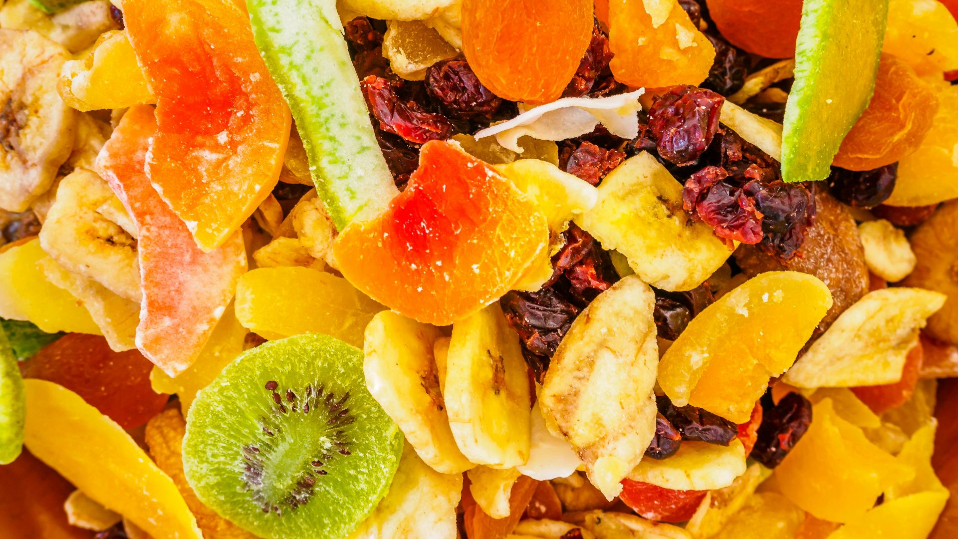 a close up of a mixture of fruit and nuts