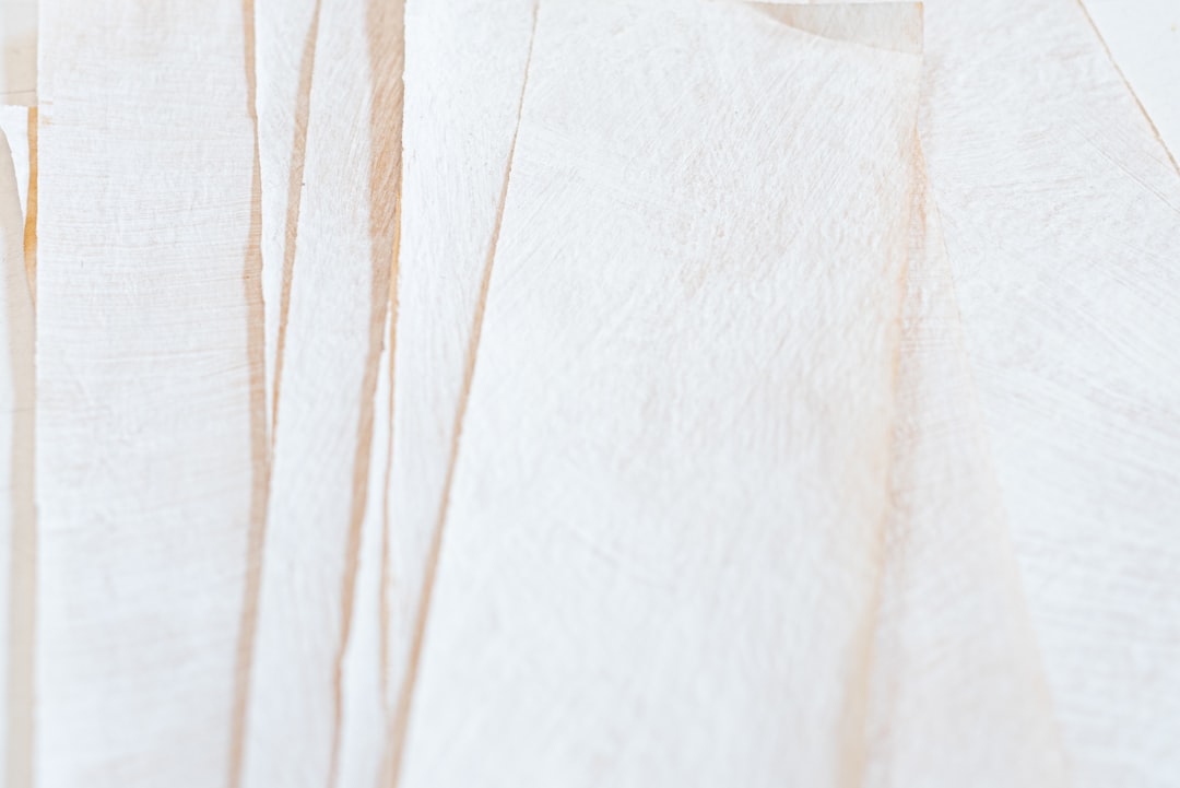 white textile with brown hair