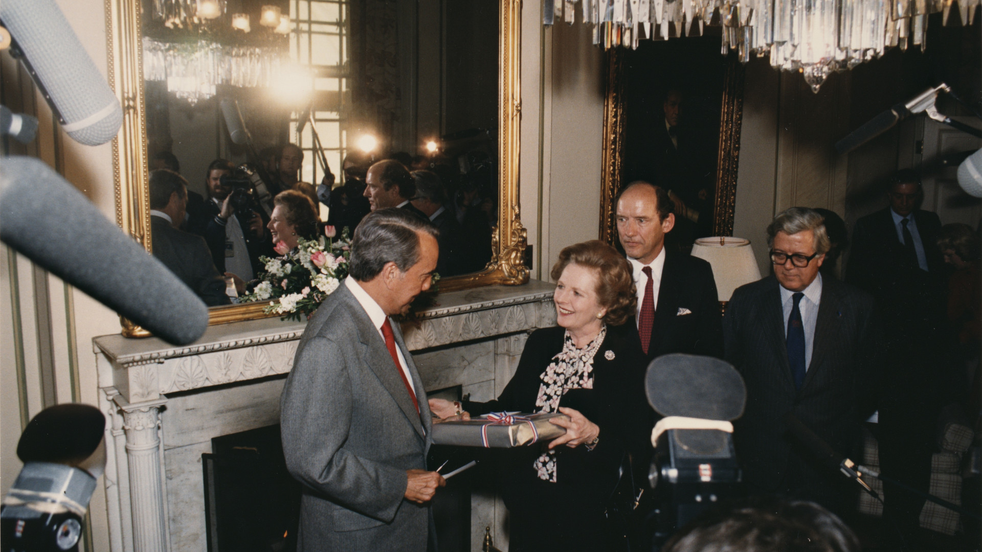 Senator_Bob_Dole_presenting_Margaret_Thatcher_with_a_gift.jpg