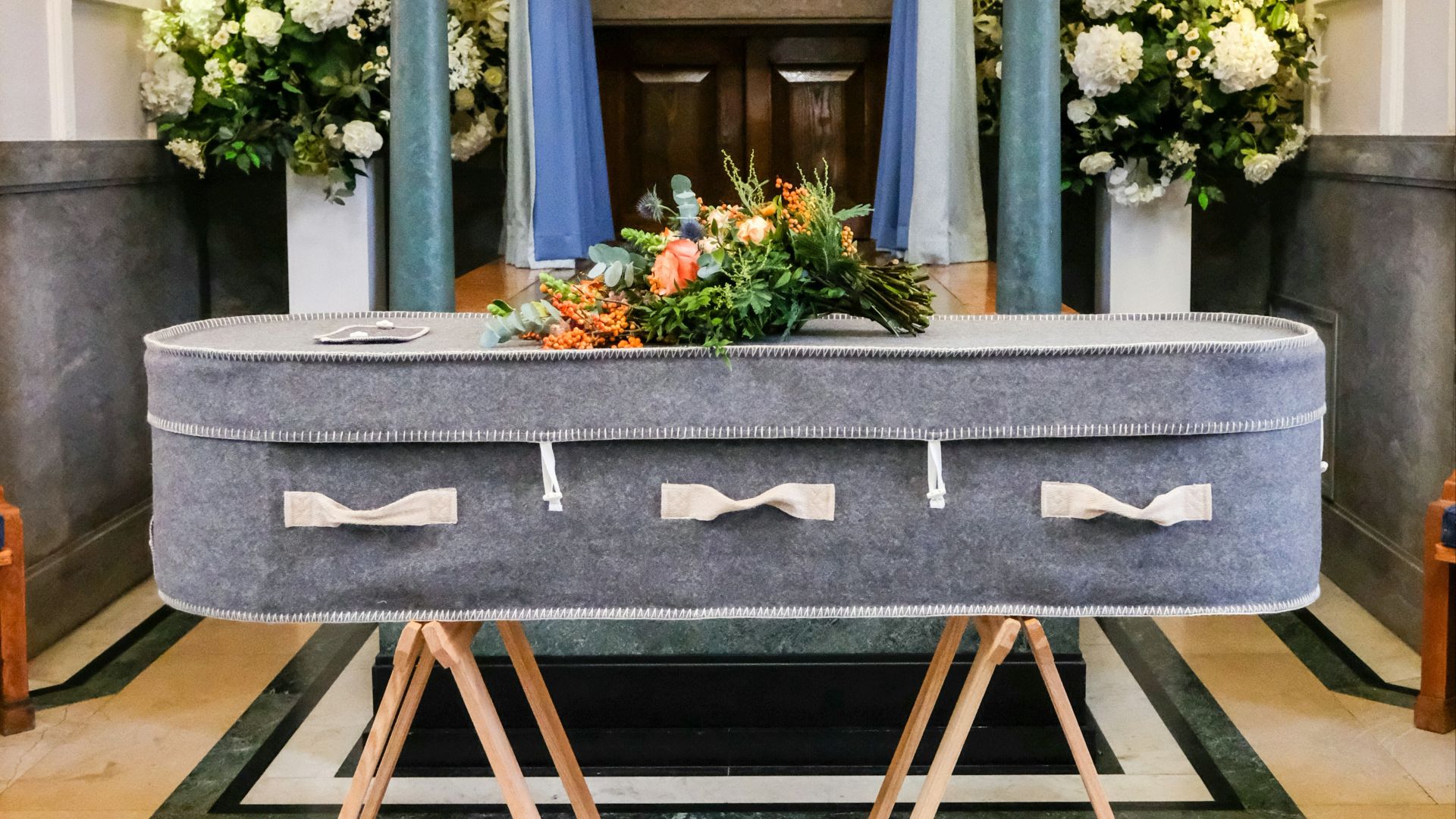 a very big nice looking church with a big table