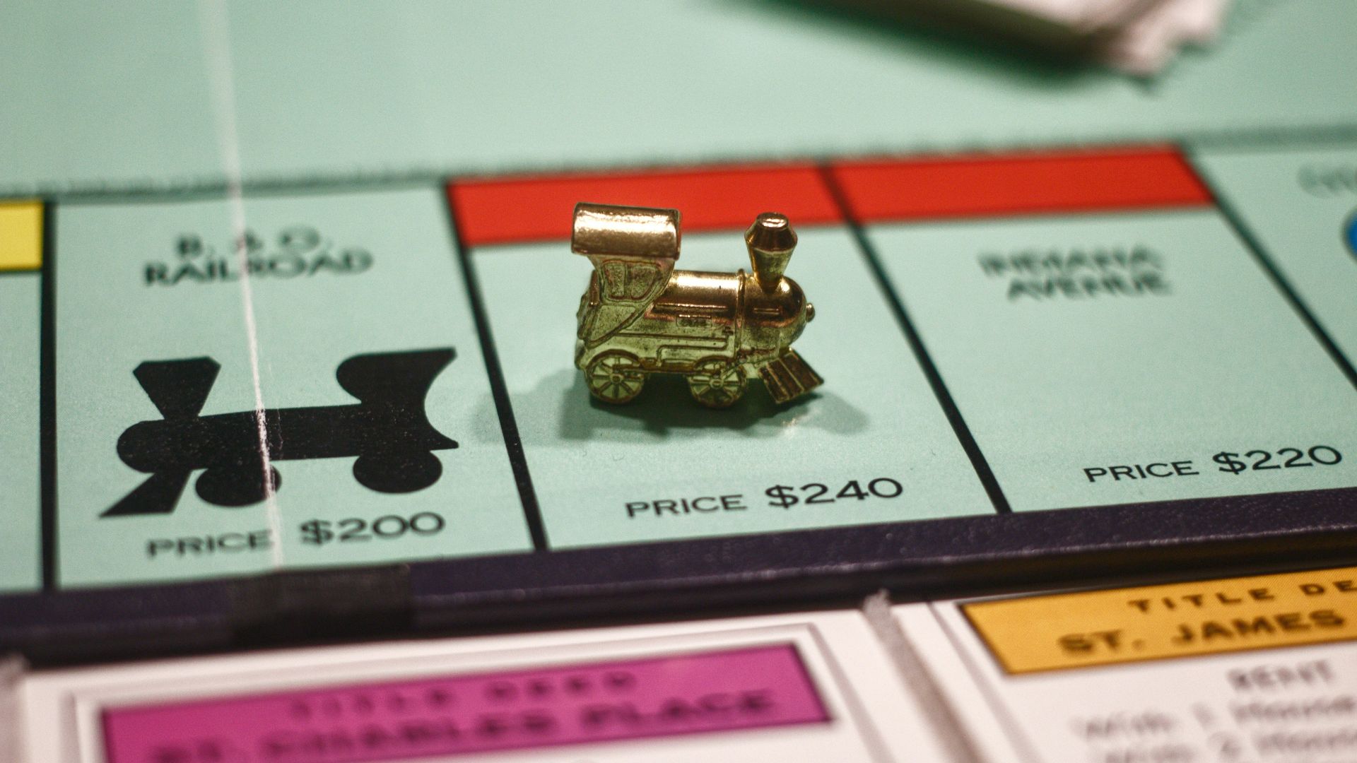 gold ring on white paper