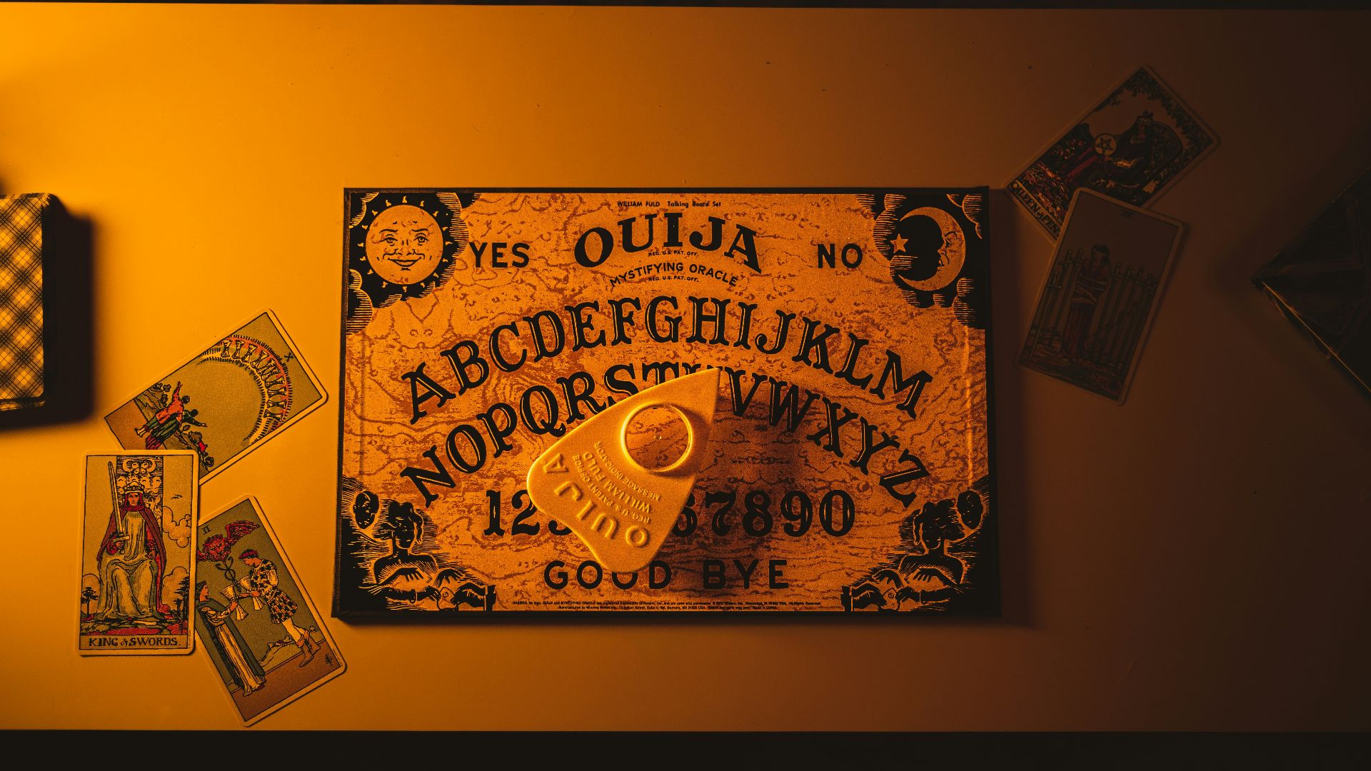 a picture of a key and some cards on a table