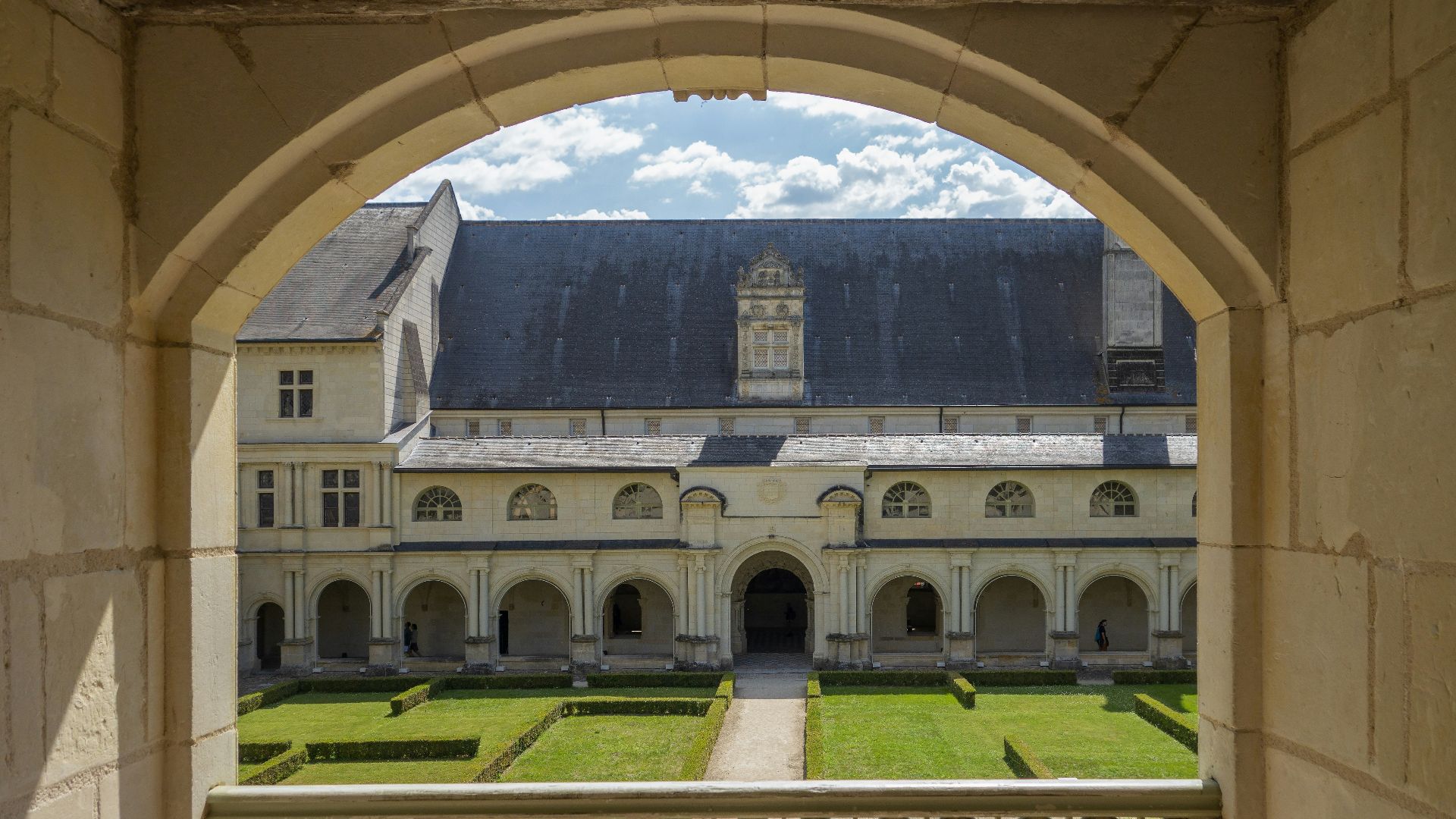 a view of a building through an archway