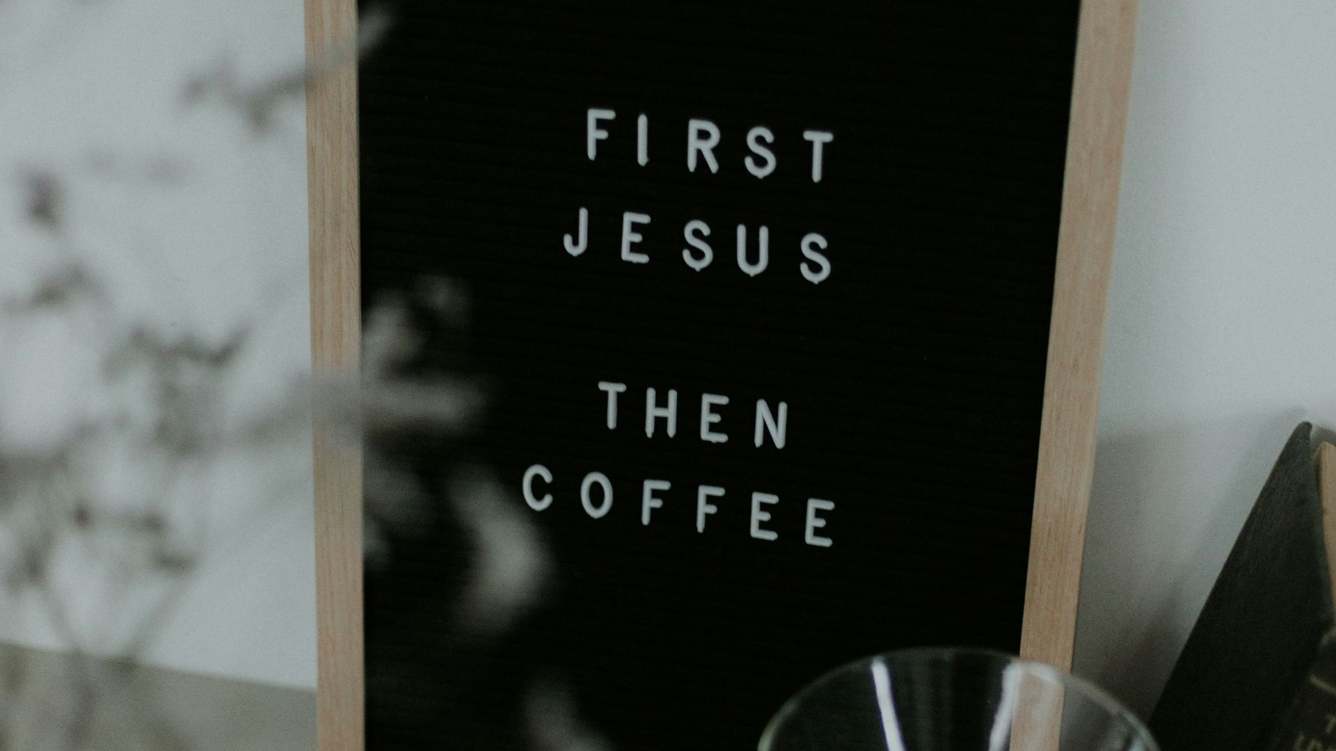 brown wooden framed black and white quote board