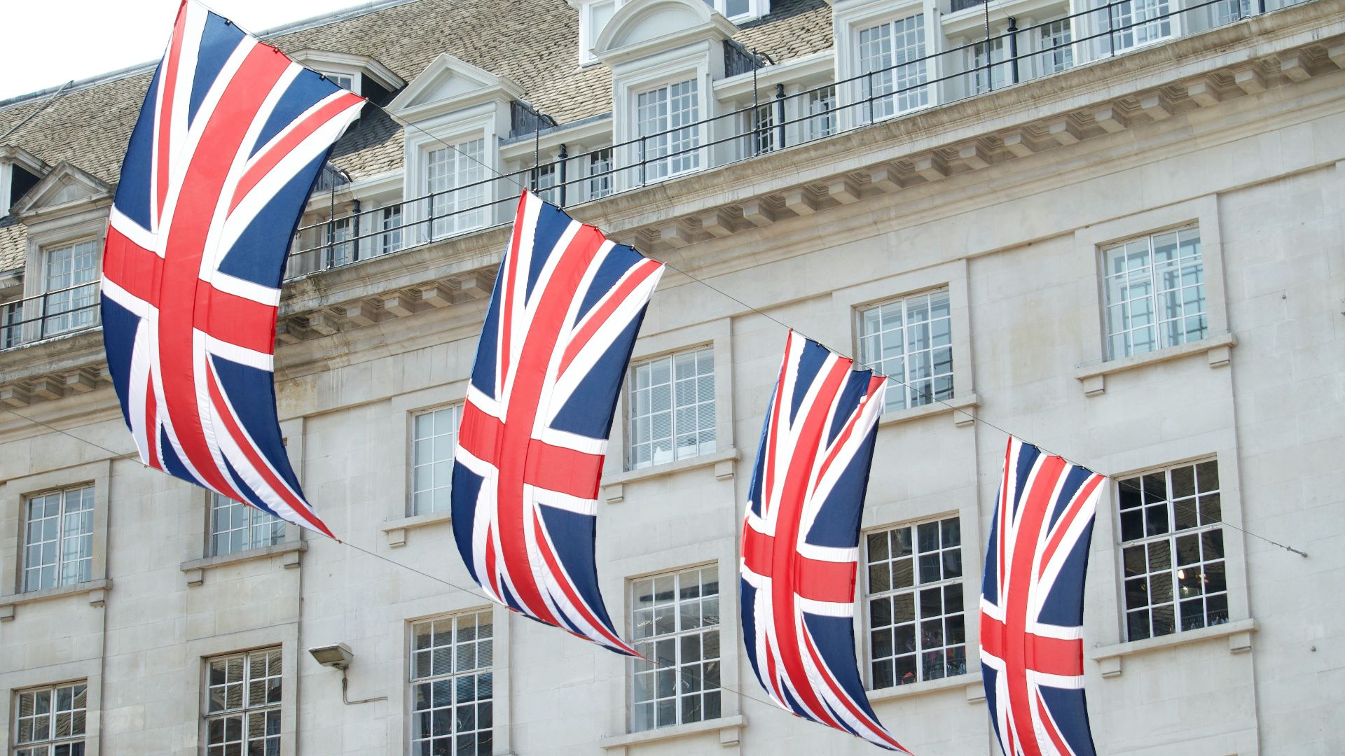 United Kingdom flags hanged near building