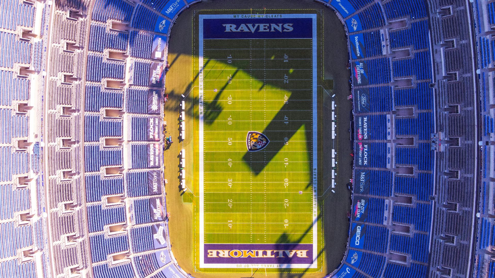 yellow and black sports car on road